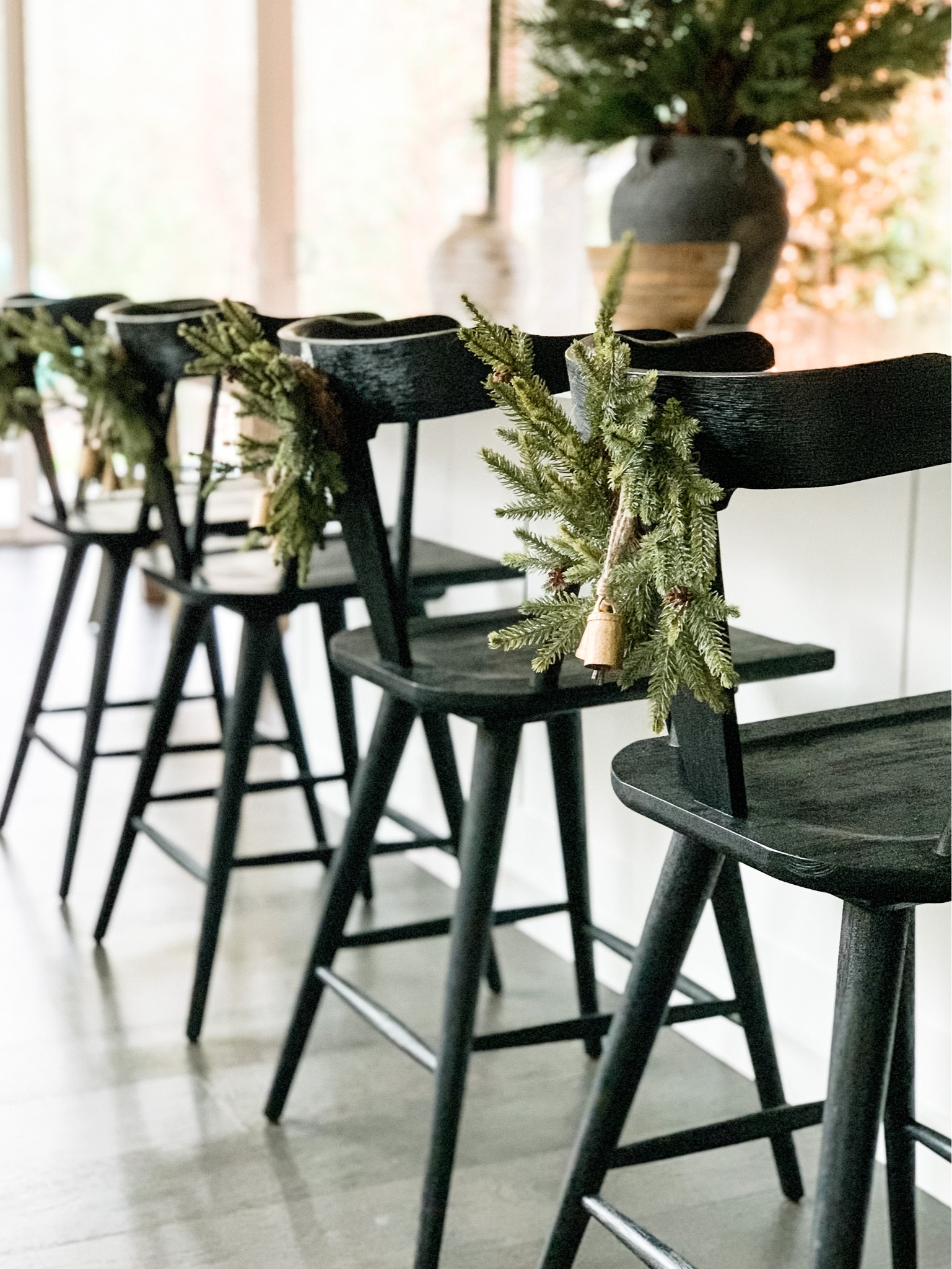 Get the look this holiday season!! I love to hang mini wreaths off the back of my stools, and accessorize with small brass bells or beautiful caramel colored ribbon.

Holiday, Christmas, inspo, home decor, cozy, wreath, stools, evergreen, pine, kitchen, island, living room, vase, pottery barn, McGee and Co, traditional, vintage

#LTKSeasonal #LTKhome #LTKHoliday