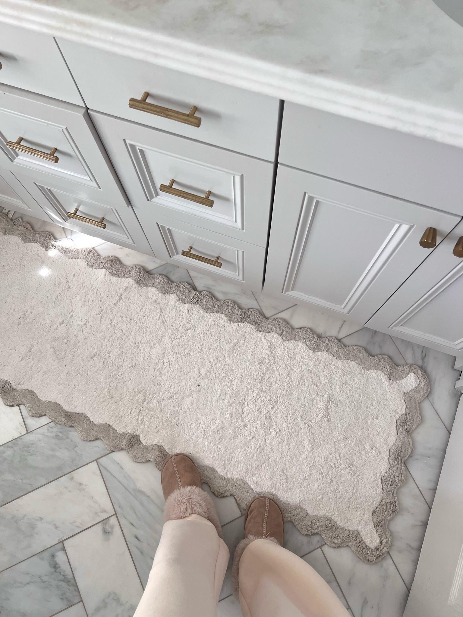 Scallop bathroom rug on sale 🤍 use code: ANTHROLIVING20 for 20% off! 

#LTKsalealert #LTKhome #LTKfindsunder100