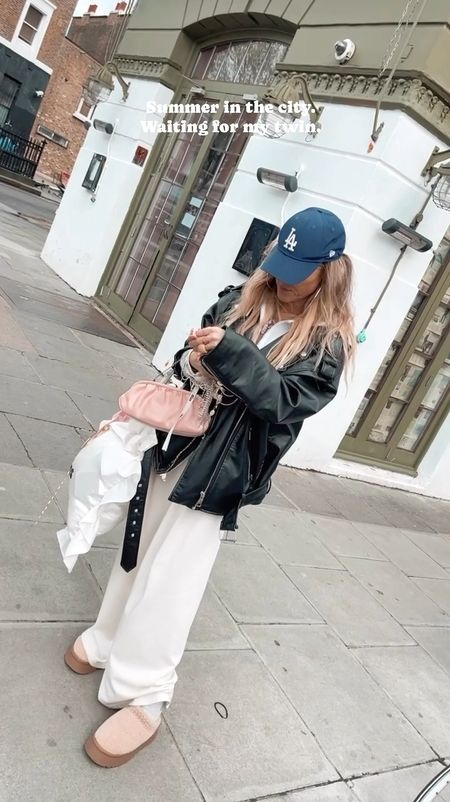 City style, #streetstyle London 
Wearing our Wide leg white pants, black faux leather jackets, our baseball caps and some cute accessories and bags to complement our looks. All linked girls, the accessories and big white ruffle pillow bags you can shop online: www.bySiss.com they are from our brand IG @prettypiecesbysiss 🎀🎀

#LTKfindsunder50 #LTKstyletip #LTKfindsunder100