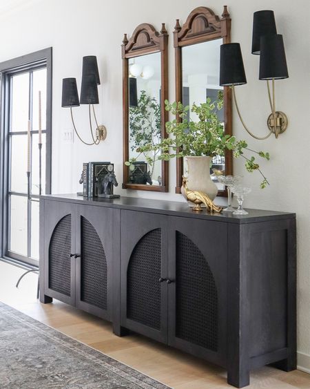 Styling our black sideboard with a new mirror soon, but love it paired with these triple arm wall sconces! Such a great canvas for many styles of decor - vintage and modern!

#LTKsalealert #LTKstyletip #LTKhome