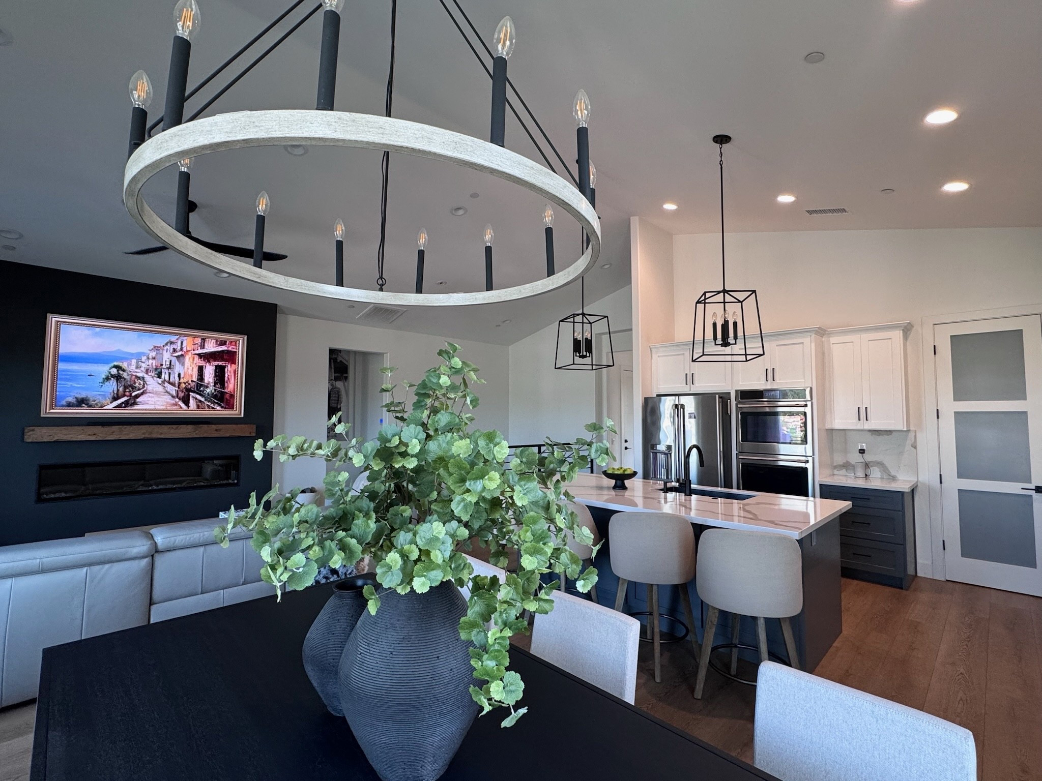 Open concept home | living room | kitchen | dining room | botanicals | island lighting | chandelier | black table 

#LTKHome #LTKU #LTKdayinmylife