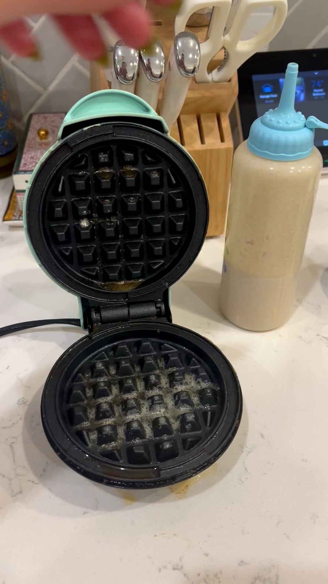 Homemade waffles are such a great weekend treat! This mini waffle iron is so easy to use and cooks quickly.
The squirt bottles keep the batter contained so you don’t end up with a mess! 

#LTKFindsUnder50 #LTKHome