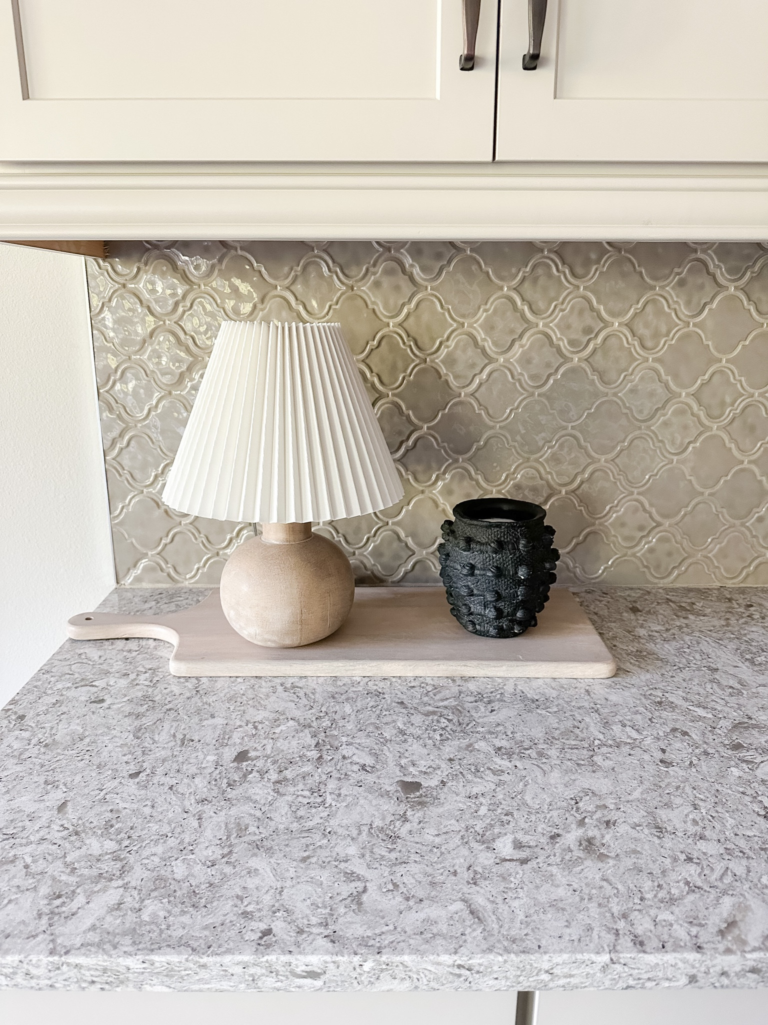 My favorite kitchen lamp! I fell in love with this lamp as soon as I saw it. I love the color of it and the pleated shade is the best! Also, don’t forget to try out these magic lightbulbs! So handy to use if you don’t have an outlet nearby.
Also pictured here is the Minka candle from Anthropologie. It smells divine. 

Minka candle, Anthropologie candle, serving board, pottery barn serving board, at home lamp, pleated lampshade, kitchen lamp, small lamp, magic light bulb, rechargeable light bulb 

#LTKunder50 #LTKhome