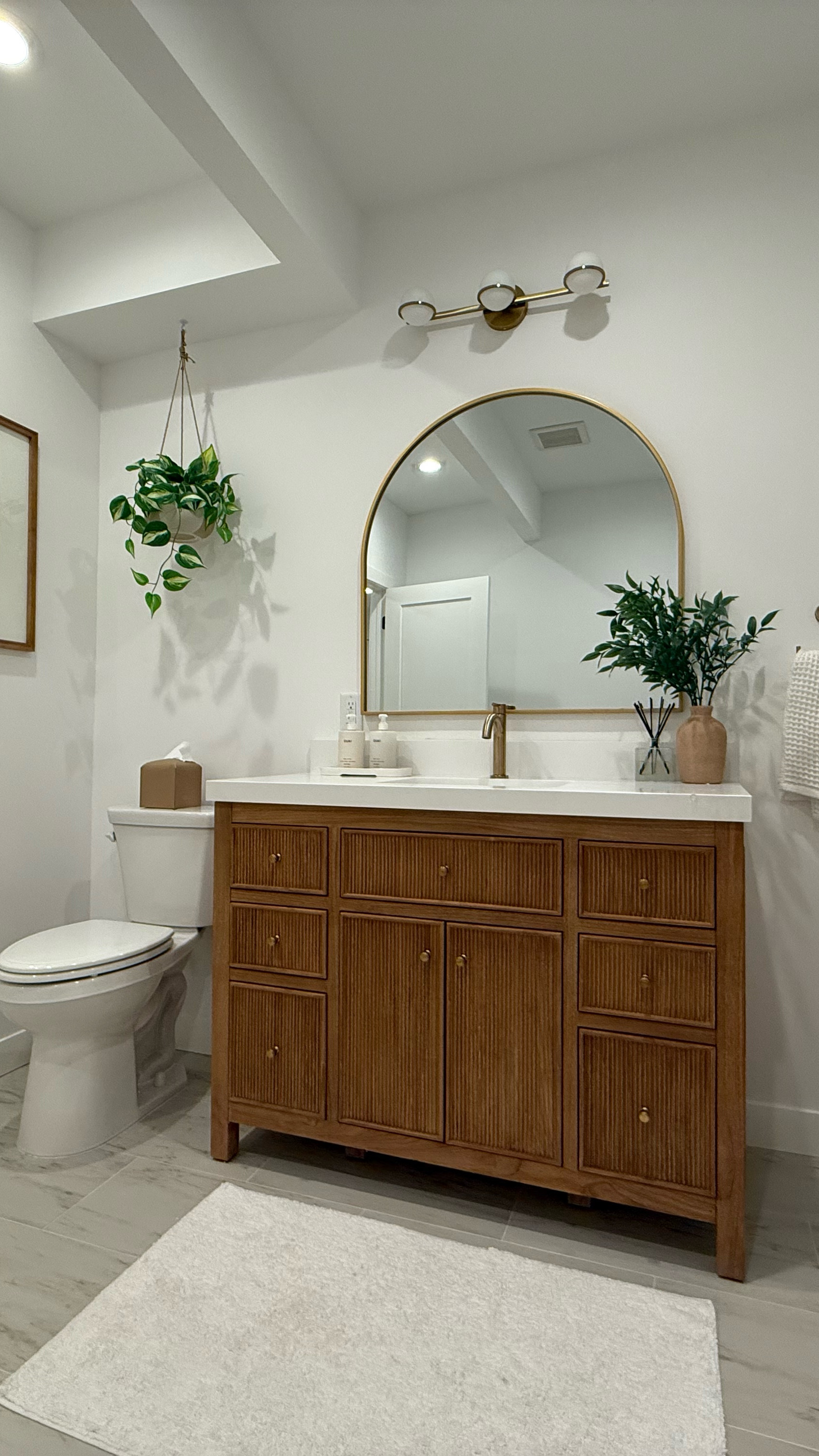 We bought a house built in 1994 that has great bones but surely outdated.  I am slowly remodeling / updating  one room at a time! Some DIY, some contract work, with design and decorating by me. This bathroom was part of our basement that was roughed out to be an extra guest quarters. From studs to now, I am on my way to a nice guest bathroom :) 

#homedecor #homerenovation #homeimprovement #remodel #basement #guestbathroom 

#LTKHome #LTKWatchNow #LTKStyleTip