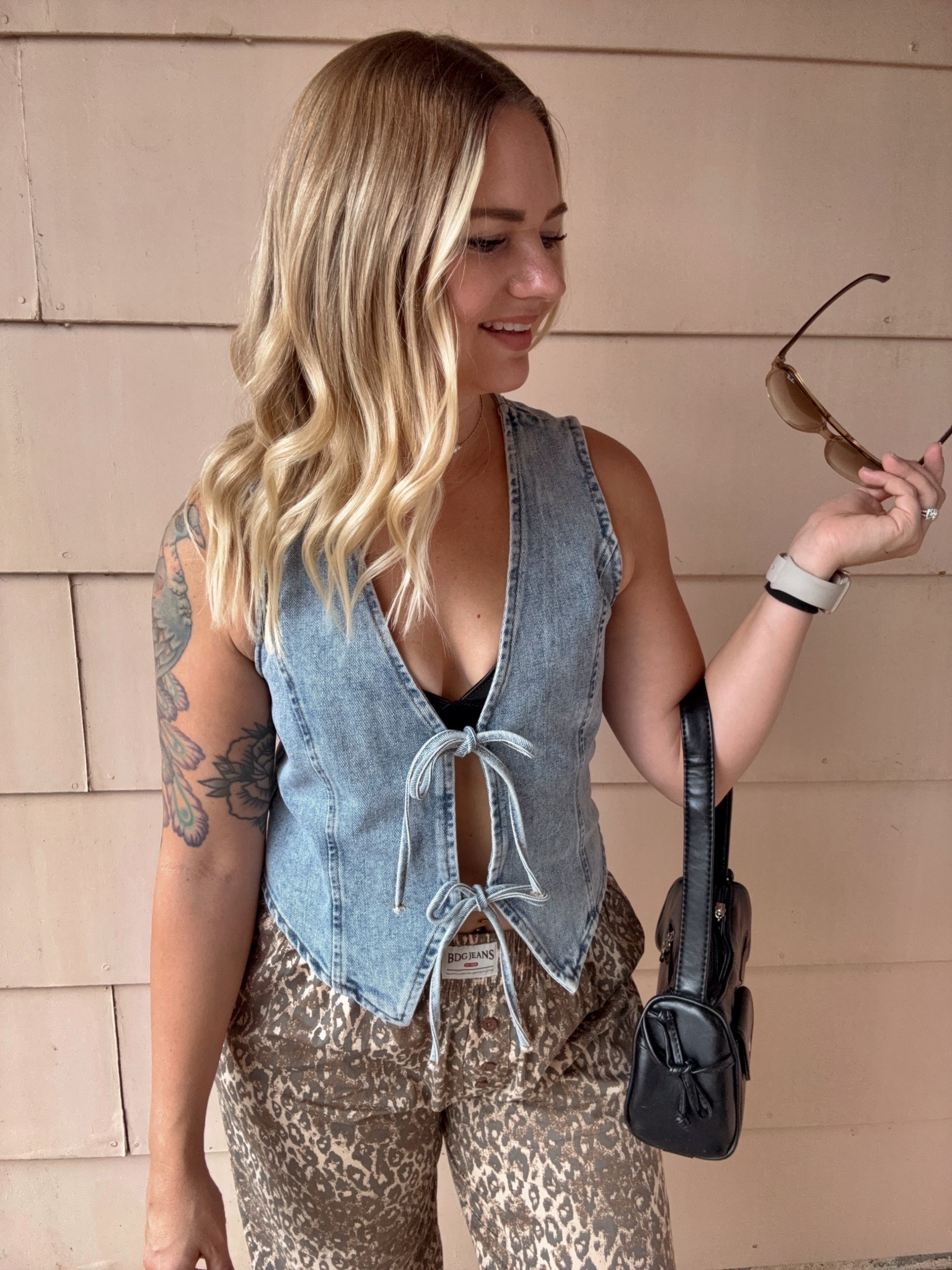 The cutest tie front jean vest and cheetah pants both on sale 🥳

#LTKMidsize #LTKStyleTip #LTKSaleAlert