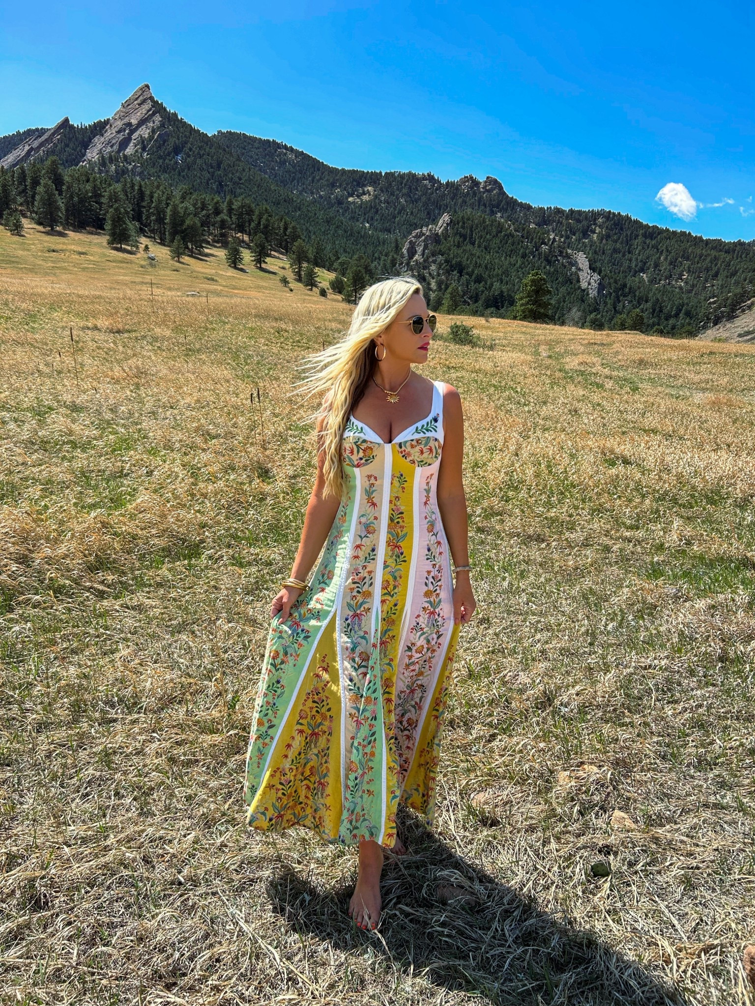 Stepping into the mountains wrapped in art 🌼✨ This @FarmRio dress is truly next-level! Every detail feels intentional, from the vibrant prints to the impeccable quality you can feel the moment you put it on.

There’s something about pairing a piece this beautiful with a backdrop like this. The mountains, the open sky - it just elevates everything. This is one of those dresses that makes you feel as stunning as the view around you! ⛰️🤍

#LTKTravel #LTKootd #LTKFestival