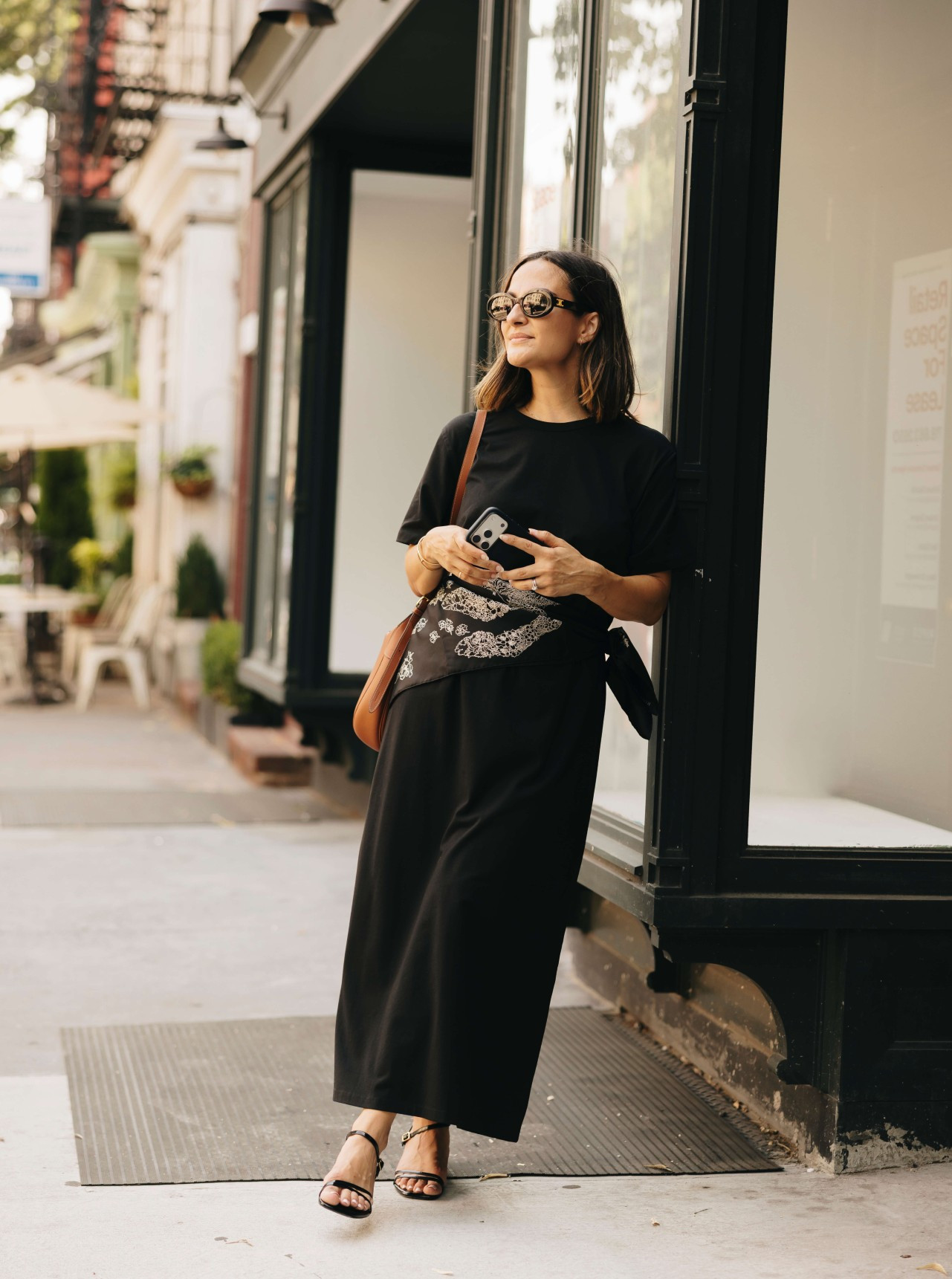 A little black dress, but with a twist! I love how tying a printed silk scarf around the waist completely changes the look of this simple maxi. Finished it with strappy kitten heels and a cognac bag for an easy summer dinner outfit!  

 #LTKootd #LTKSeasonal