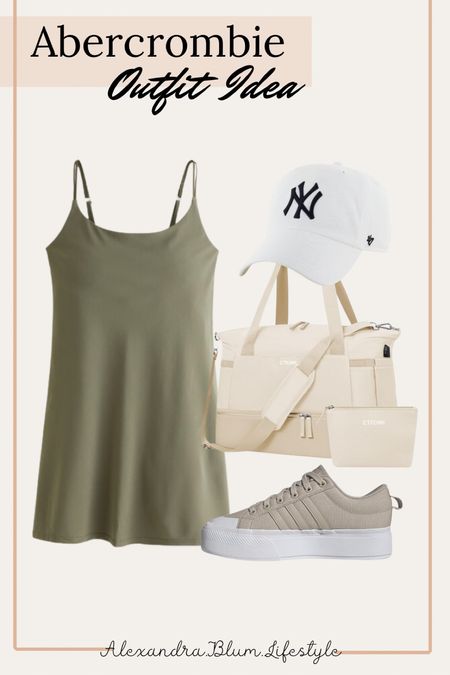 Cute casual travel outfit idea! Athletic mini dress, platform sneakers, weekender duffle bag, and baseball cap! Casual outfit! Vacation outfit! Casual dress! 

#LTKfindsunder100 #LTKmidsize #LTKActive