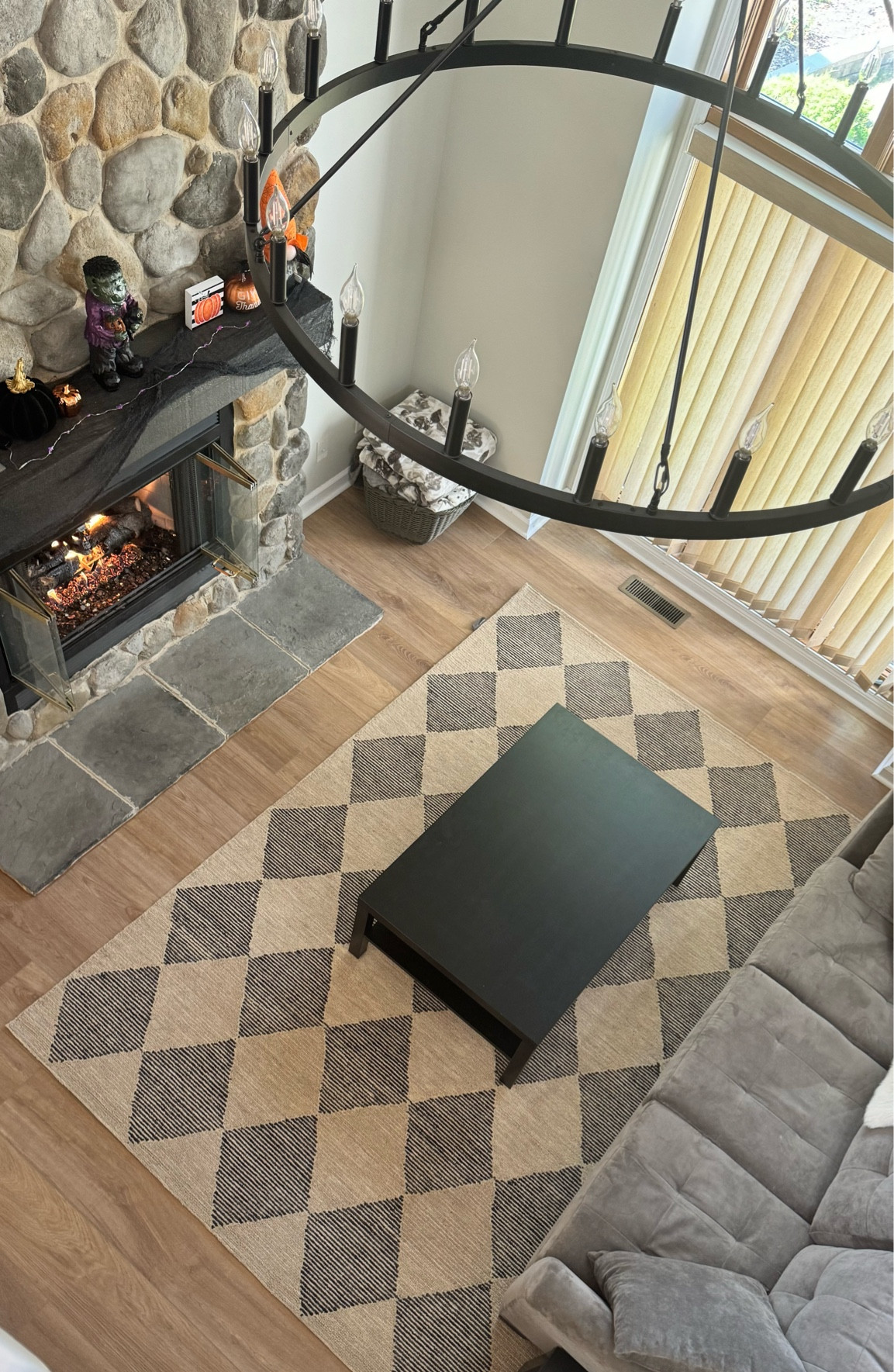 Living room update. Wool checkered rug and large chandelier.



#LTKVideo #LTKHome
