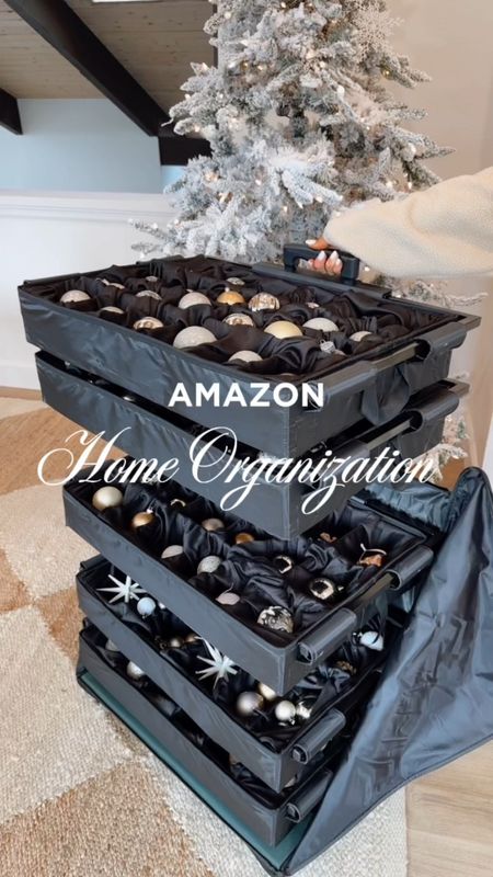 🎄✨ Tired of the holiday headache of storing your precious ornaments? Say hello to the Deluxe Ornament Storage – your ornaments' new BFF! 🎁🌟 #founditonamazon #amazonfinds #christmasornaments #ornamentstorage
Grab Yours Here: https://amzn.to/3TBiRUC

This magical storage solution stores away every size bulb and ornament with a nice cushion barrier, ensuring your festive treasures remain as merry and bright as ever! 🌈✨ Its adjustable and removable dividers dance to the beat of your decorating dreams, allowing you to customize spaces as if you were arranging ornaments on a tree. 🕺💃

But wait, there's more! This storage wizard has wheels that glide across the floor, turning your post-holiday cleanup into a whimsical waltz. No more awkwardly lugging heavy boxes – just let it roll and twirl its way to storage stardom. 🎶🕺

Consider it not just a purchase, but an investment for your keepsakes. Your ornaments deserve a five-star hotel experience during their off-season, and this storage gem delivers just that. 🌟🏨✨ Don't let your ornaments go into hibernation without the Deluxe Ornament Storage – because every bauble deserves its own happily ever after! 🚀🎀 #StorageSolutions #HolidayMagic #OrnamentOrganization #DeluxeStorageDreams

#LTKhome #LTKHoliday #LTKVideo