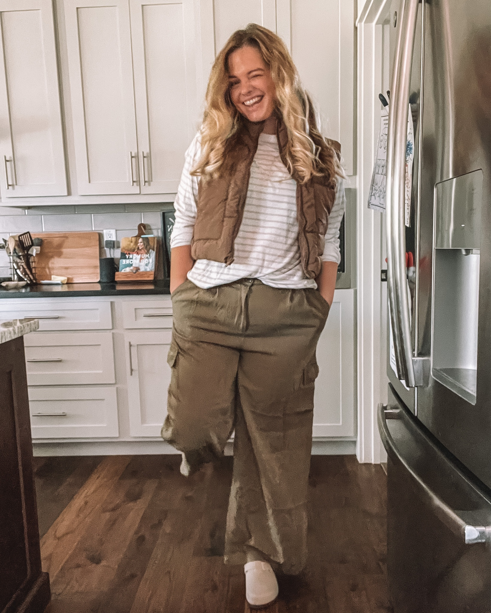 Fall outfit, cargo pants, puffer vest, casual style

#LTKmidsize #LTKstyletip #LTKfindsunder50