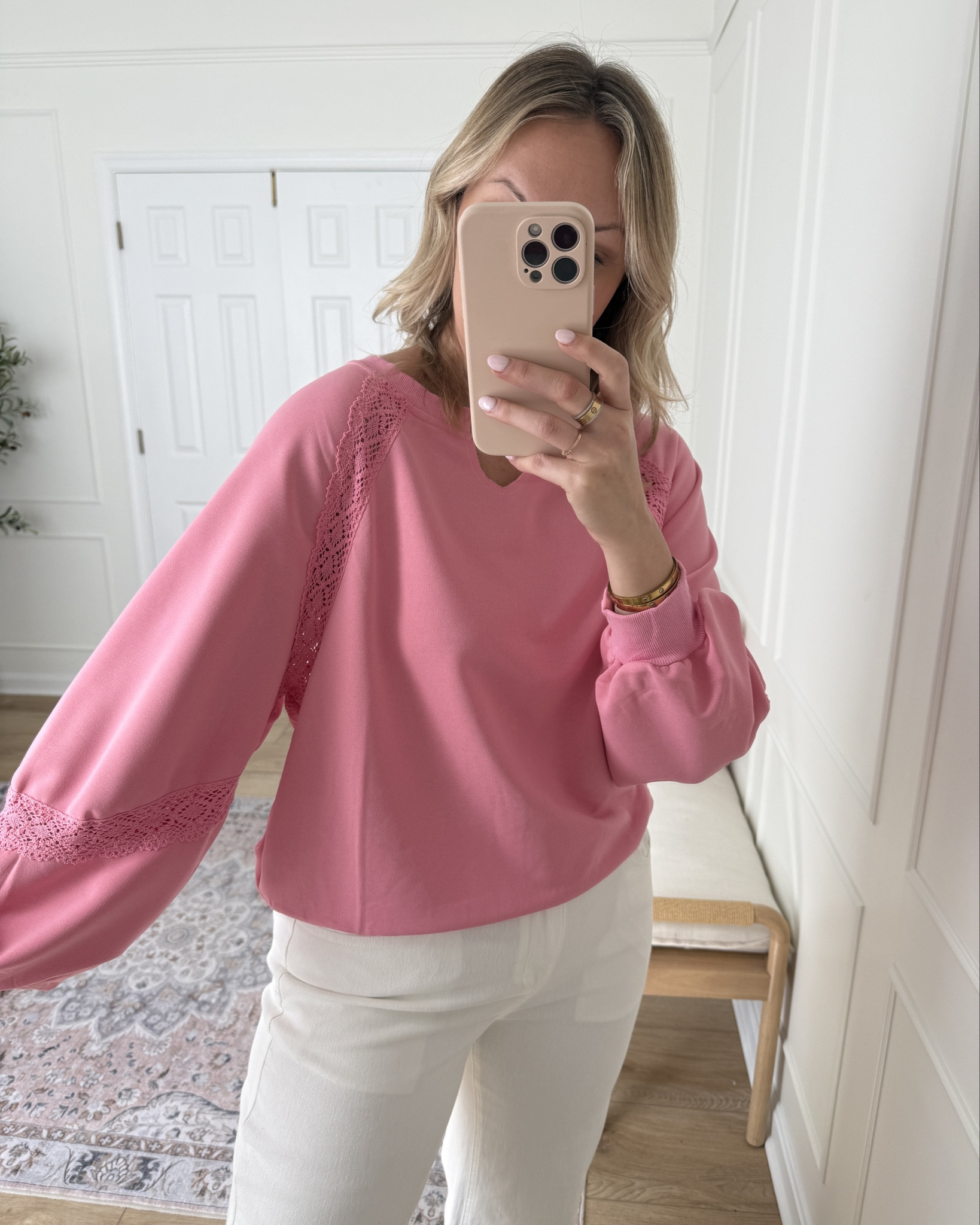 Look for less lace detail sweater for spring! Wearing a med 