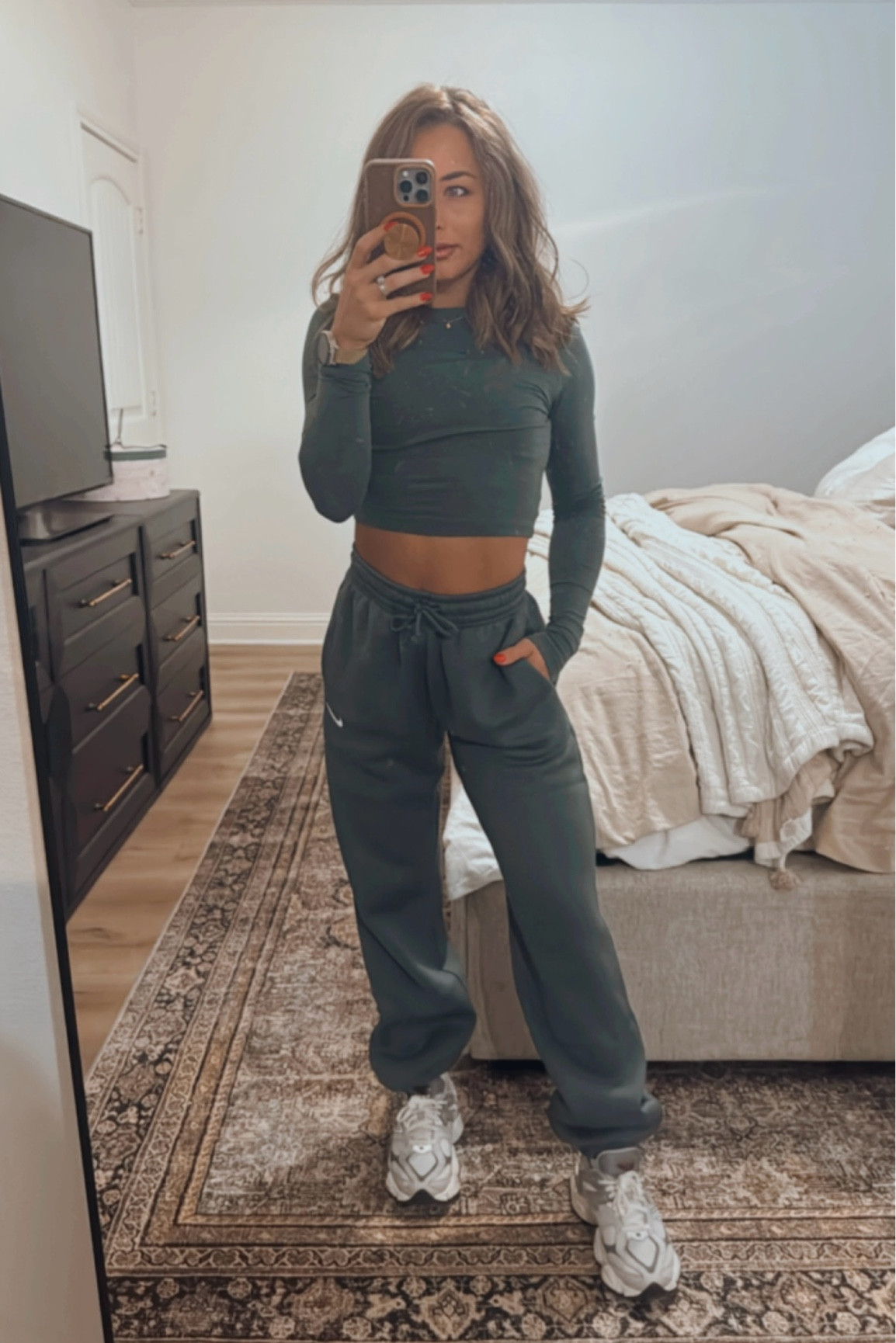 Nike cozy set 💚 and rug link because y’all keep asking about it! I love it so much - such a great price! 

Sweatpants - XXS
Top - XS
Rug size - 9 x 12

#LTKHome #LTKFitness #LTKActive