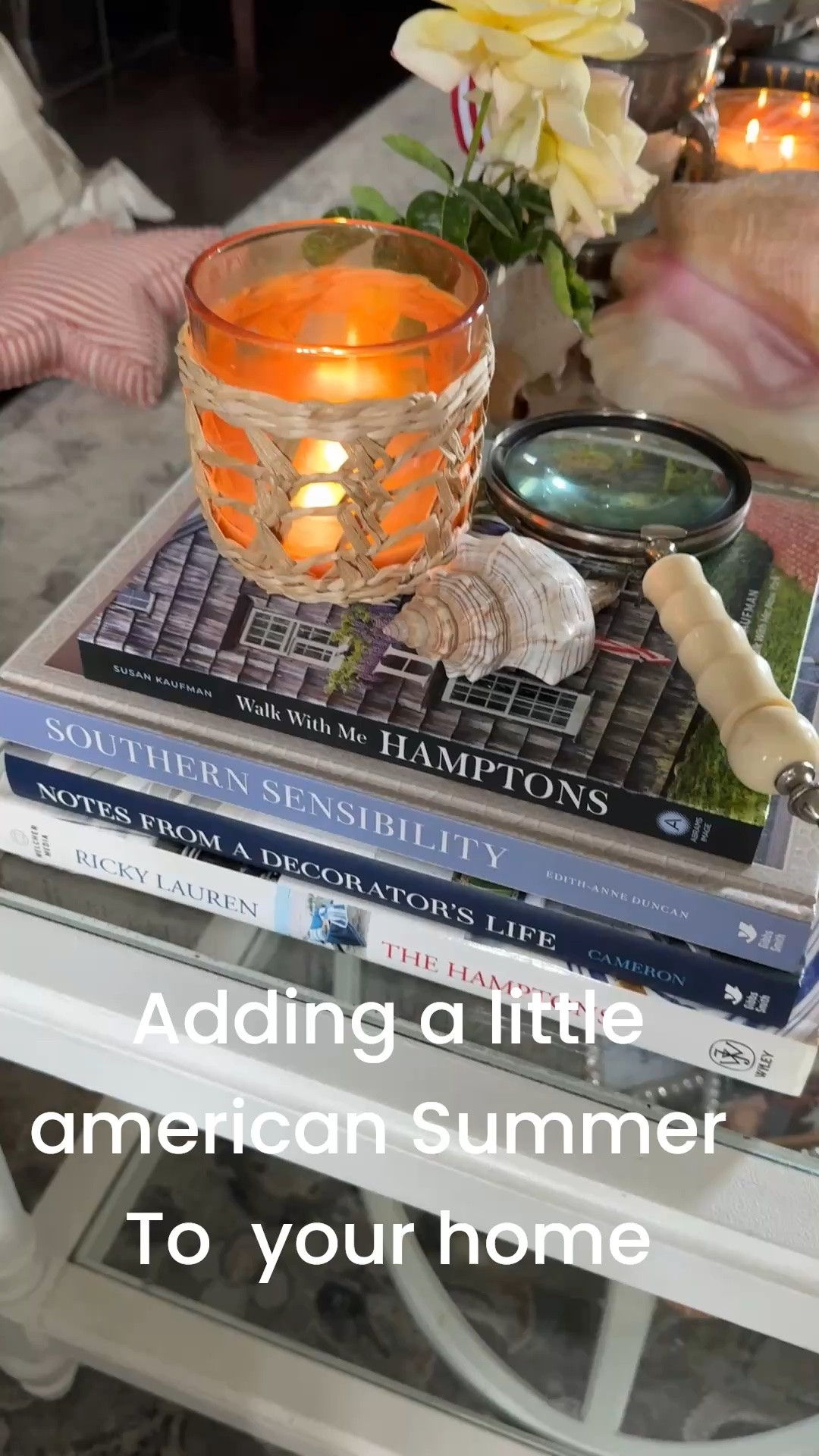 Add a little American coastal Summer 
To your home…

A fun little coffee table refresh

Stack coffee table books
-Walk with me Hampton’s
-Southern sensibility 
-Note from the decorator life 

-Ricky Lauren The Hampton’s - a collection of their homes in the Hampton’s stories and her family recipes 
 Not in this stack but one of my favorite books

-Camps and cottages

Sea grass glass candle in a beautiful summer fragrance 

Seas shells collected from our beach vacations over the years 

A bone handle magnifying glass 

Mini flags 

A  konk shell from the BVI 

Don’t collect shells I linked some you can purchase

#LTKHome #LTKstorytime #LTKdayinmylife