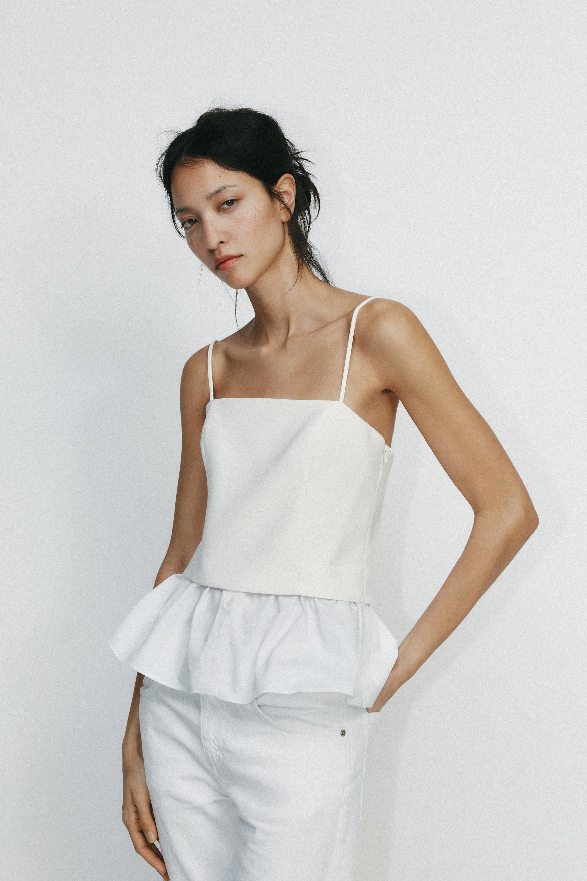 Top with a straight neckline and adjustable spaghetti straps. Combination fabric at hem. Side zip... | Zara US