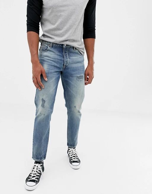 ASOS DESIGN 14oz heavy weight tapered jeans in mid wash blue with rips | ASOS US