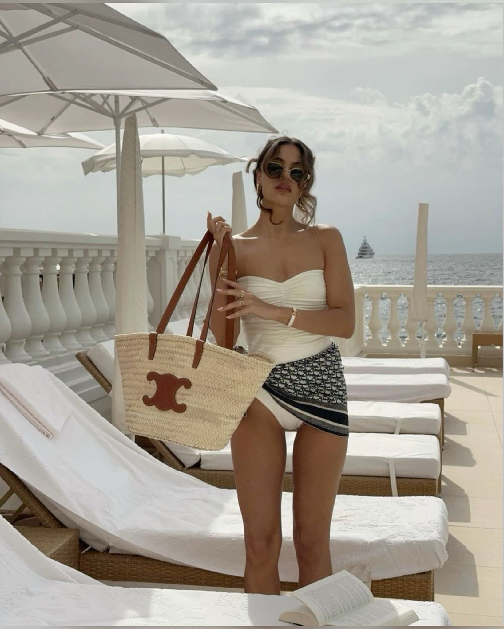 Effortlessly chic and beach-ready with this timeless tote—where classic style meets seaside elegance. 🌊☀️ #LuxuryEssentials #SummerVibes

#LTKItBag #LTKSwim #LTKTravel