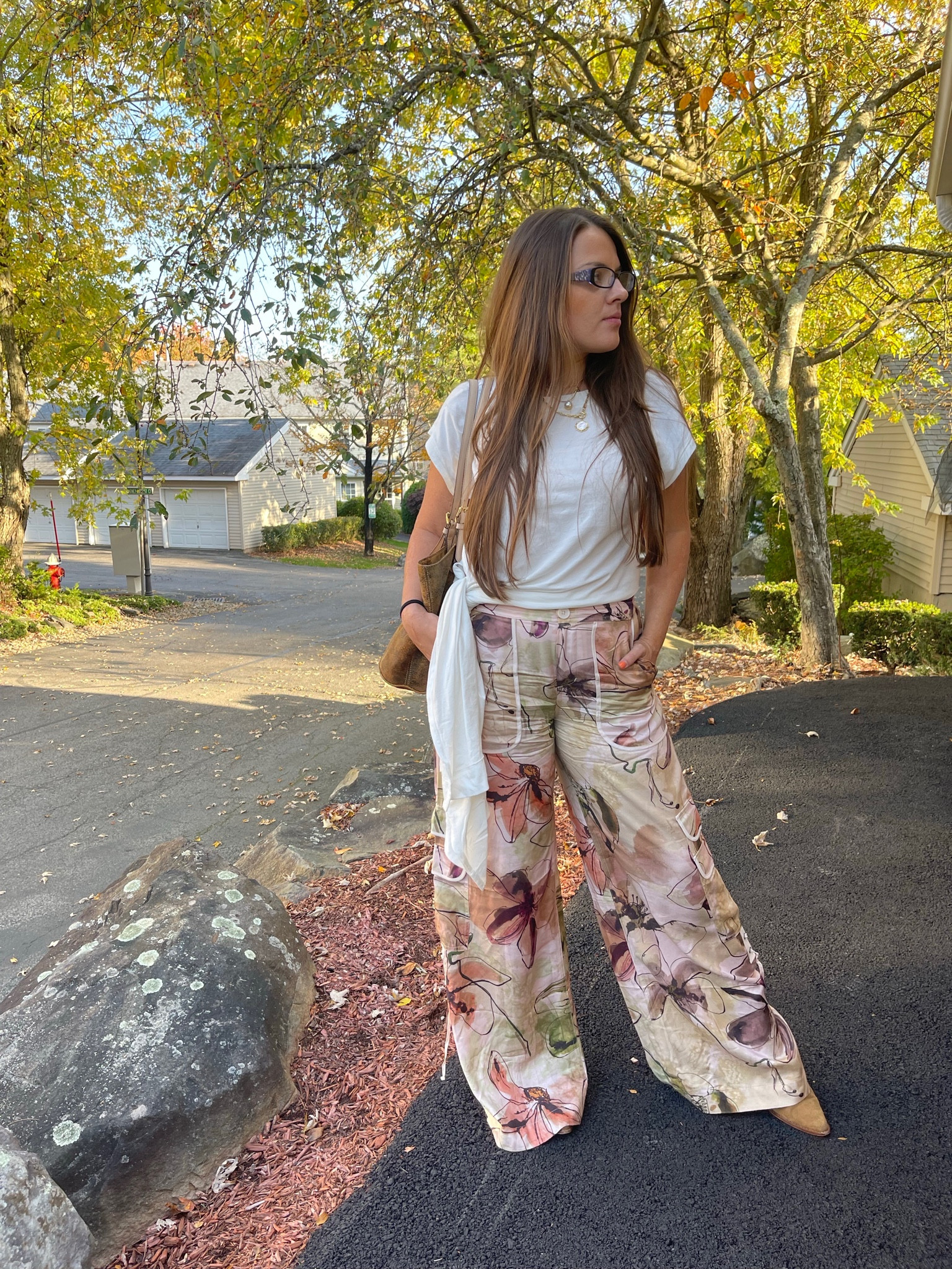 OOTD: Printed Floral Flowy Cargo Pants (work appropriate too, might I add) and this long shirt tied to the side with a good staple bootie 🤎🌸

#LTKshoecrush #LTKstyletip #LTKSeasonal