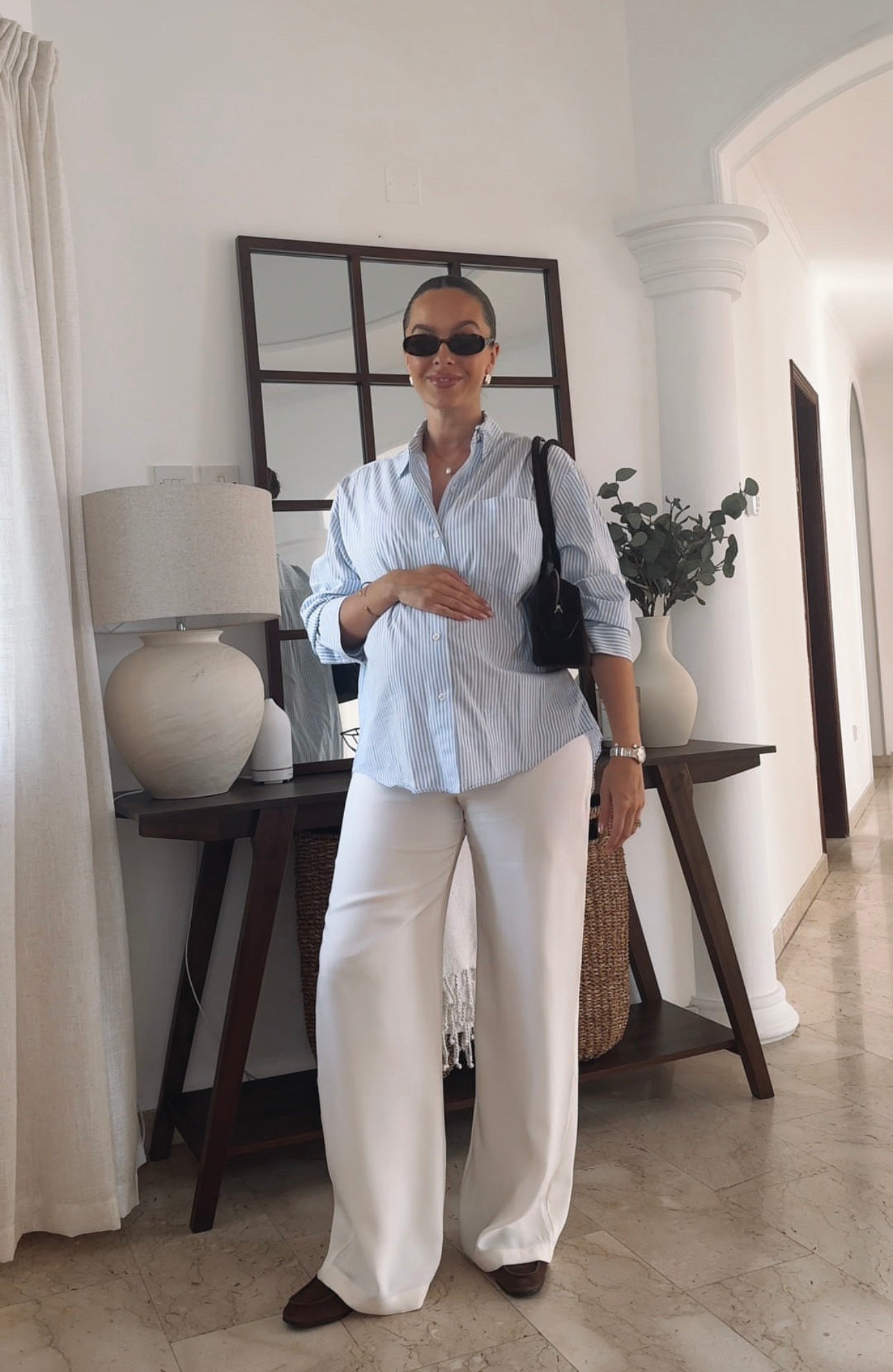 Bump-friendly workwear outfit that isn’t maternity wear 🤍

Exact outfit details 👇🏽 

Shirt - old Zara 
Trousers - kookai (Maria) 
Loafers - Zara 
Bag - Limé
Sunnies - linked 

Other similar items linked below 

#LTKmaternity #LTKworkwear #LTKspring