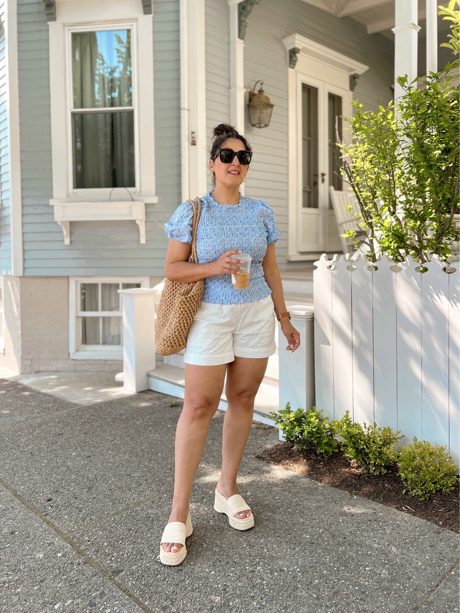 Blue and white casual Summer ootd. JCrew floral smocked top. GAP eyelet shorts. MADDEN Girl rafia platform sandals.

#LTKSeasonal #LTKstyletip #LTKsalealert