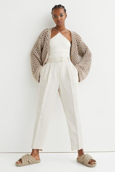 Ankle-length pants in woven fabric. High waist, waistband with pleats at front and covered elasti... | H&M (US + CA)