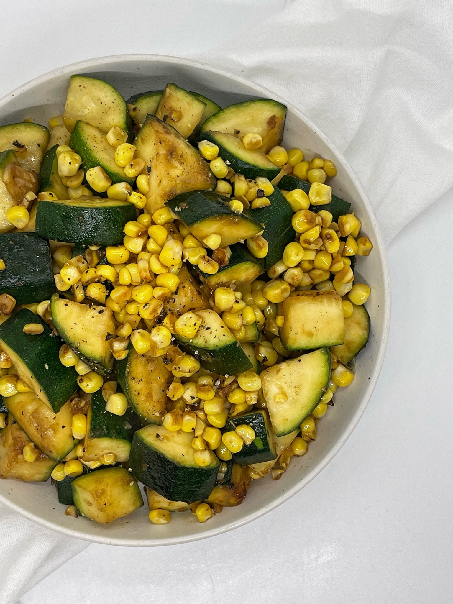 PAN SEARED ZUCCHINI & CORN 🥒🌽 It’s a ready in 10 minutes, beautifully blended, easy side dish anyone can make. 

TO MAKE: Heat olive oil in a pan on medium heat. Add bite-sized pieces of zucchini. Sear for 1 minute. Add corn, salt and pepper. Sear, mixing often, for another 3-4 minutes.

#LTKunder50 #LTKhome #LTKunder100