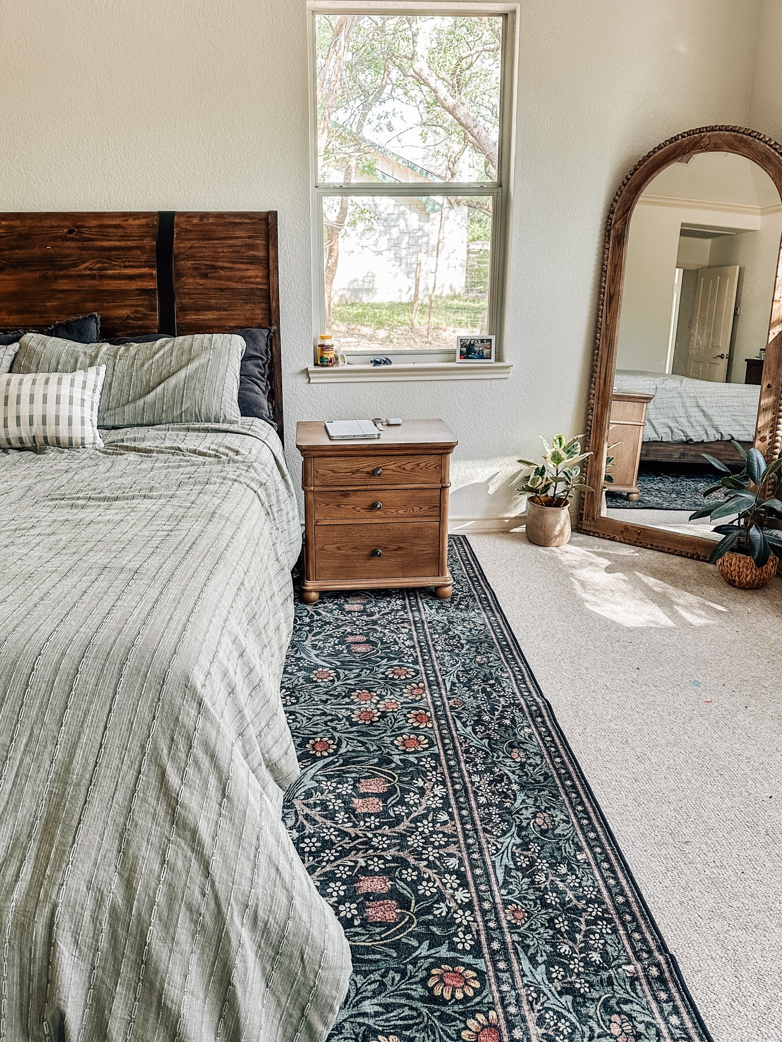 After months of chaos, I finally have our bedroom where it’s starting to feeling cozy again! ✨ 

There’s nothing like having a space that feels like a peaceful retreat, especially with all the craziness of life right now. Soft blankets, wooden accents and a few personal touches were all it took to make this room feel like *home* again. 

#rug #bedroom #nightstand #bedding #hearthandhand #sheets #comforter #cozybedroom 

#LTKFindsUnder100 #LTKHome #LTKSeasonal