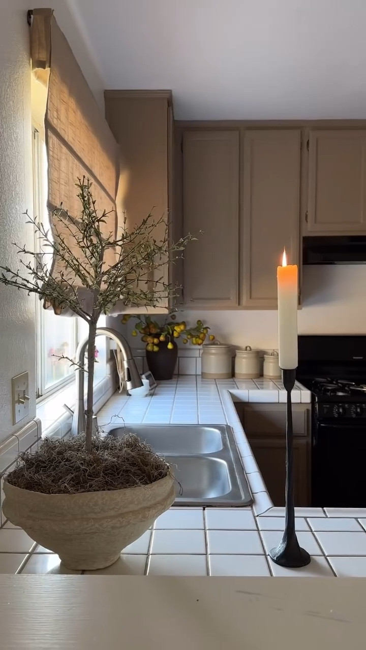 The answer is yes 

Your spouse can be your husband and handy man 🤭 
And two you can transform a space with super minimal work. All I did in this space was simply paint the cabinets and replace the blinds with these Roman shades from @tailorvibe_official which are not lined allowing for just the right amount of natural light to come through 🤎

Follow for more home content @casarustica29 

#home #neutrals #tailorvibe #romanshades #kitchen #kitchenupdate #kitchenminimalis