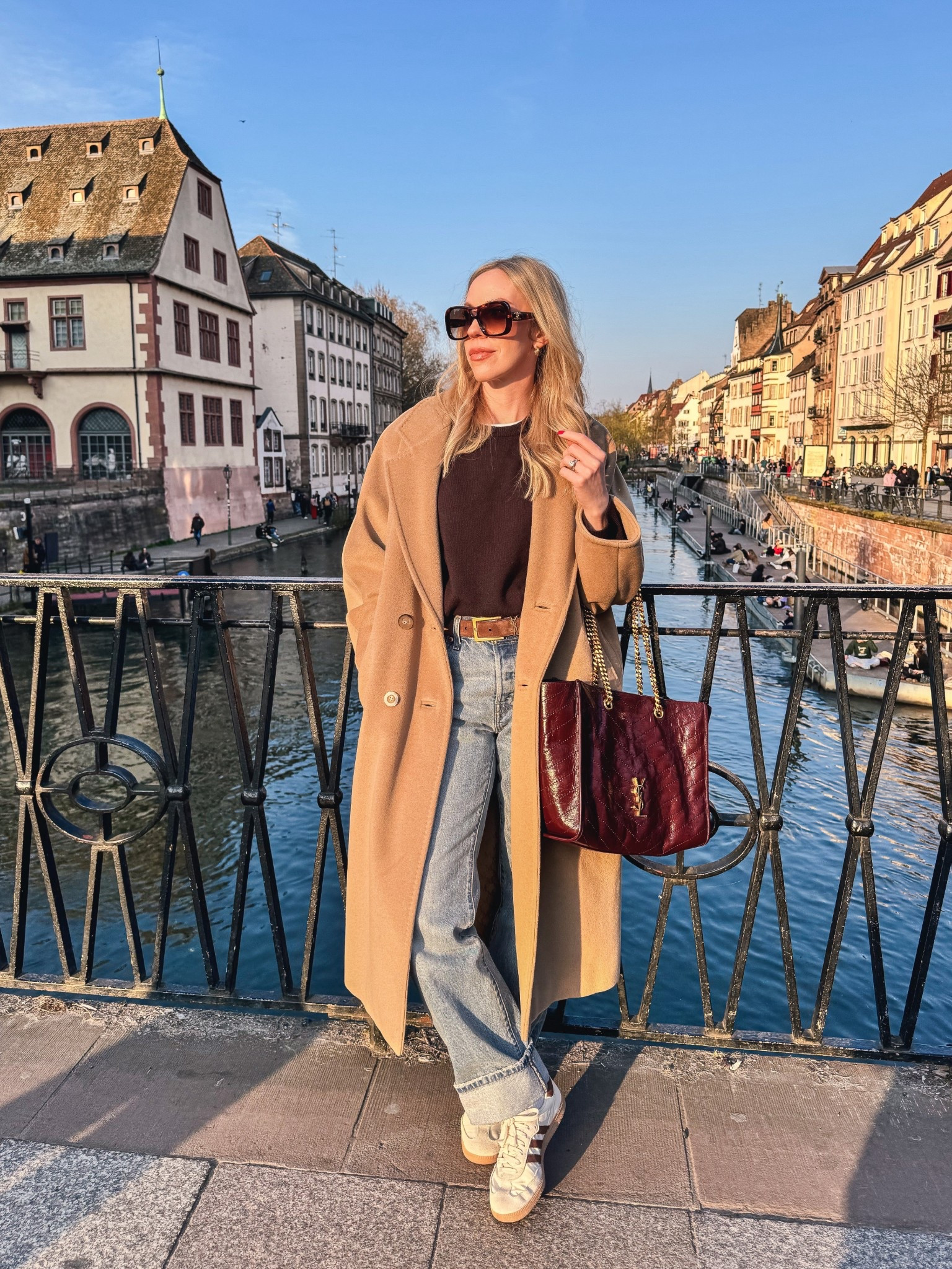 Spring outfit idea, travel look, camel coat, @Levi's cuffed baggy jeans, Adidas Samba sneakers, burgundy YSL tote bag , European vacation style 

#LTKSaleAlert #LTKSeasonal #LTKTravel