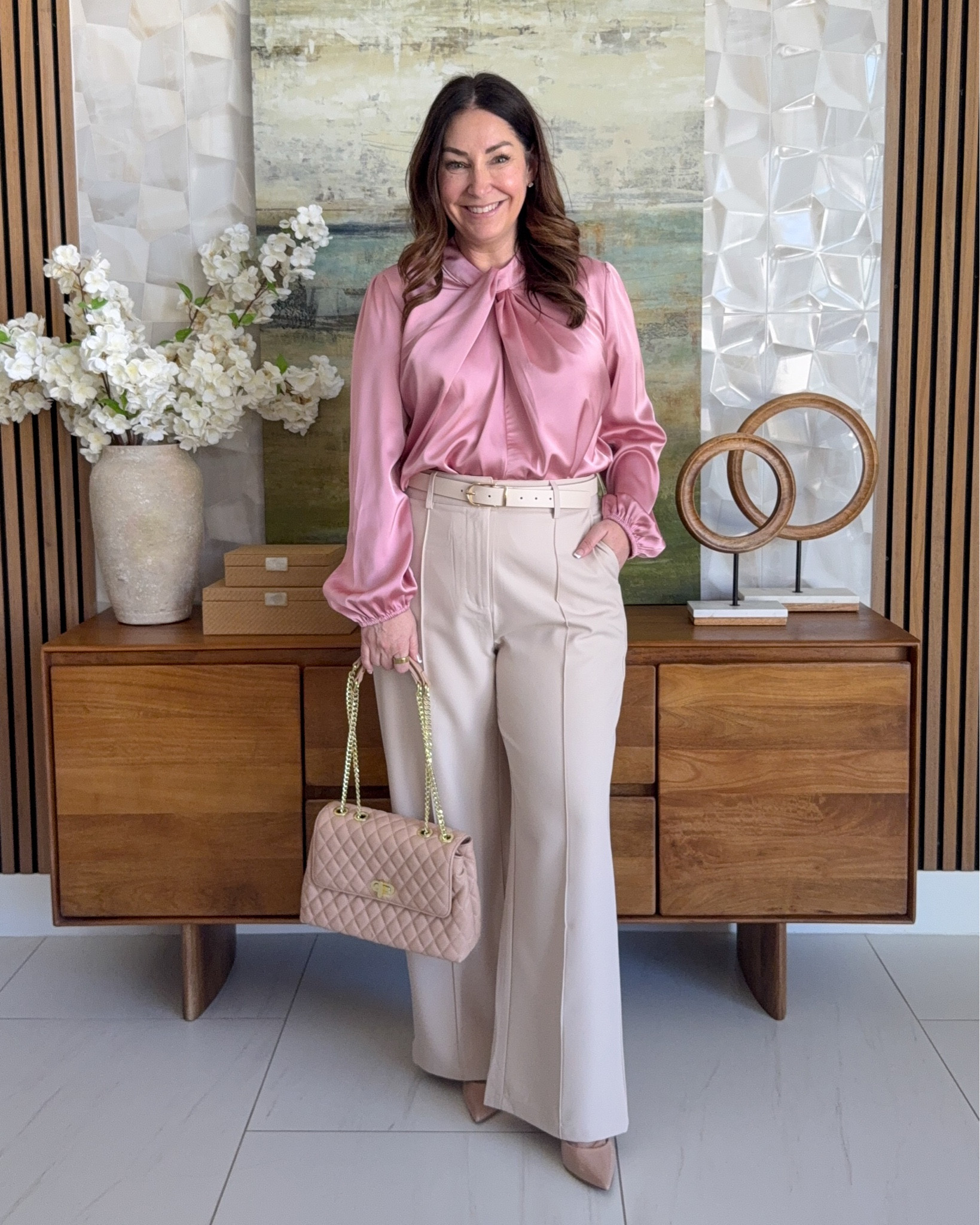 Spring Workwear with bright colors for the season. Loving this silky top in dusty pink and cream pants with from seam. These pants are great because they do not have a stretchy back making them more tailored looking. Wearing large in blouse, 12 in pants 

 

#LTKOver40 #LTKMidsize #LTKWorkwear