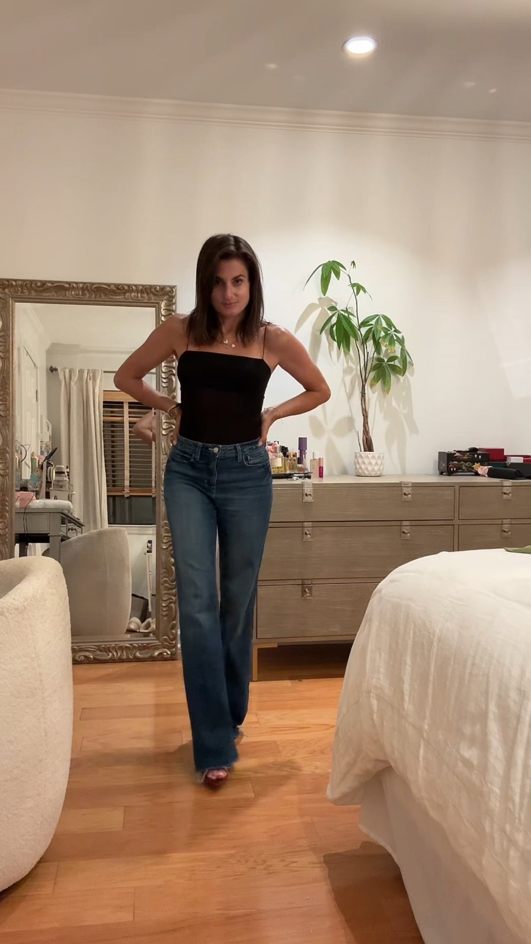 Black @Aritzia bodysuit and @lagence jeans for dinner on a Tuesday