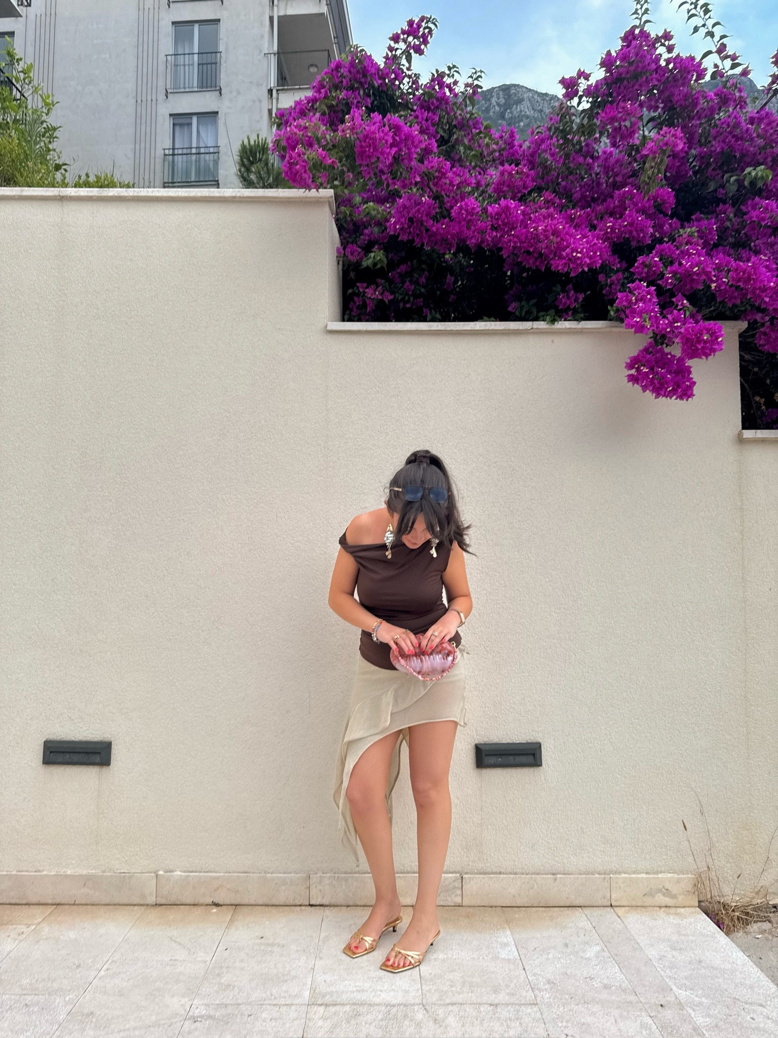 An easy vacation dinner look 🤎 This off-the-shoulder top + asymmetrical linen skirt is one of those outfits that looks elevated with minimal effort. Finished it off with gold heels, statement earrings, and a little clutch for sunset by the water. ✨🌊

Linked everything (or the closest matches!) here for you. 🤍

#LTKootd #LTKSeasonal #LTKTravel