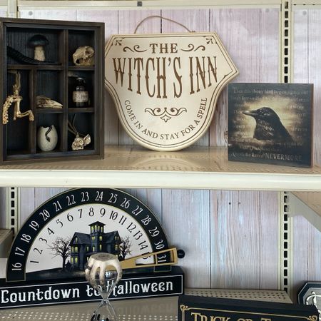 Order online to buy before its sold out, ship, or pick up! Give your holiday décor a spooky flourish with this wall sign from Ashland. This sign features "The Witch's Inn". This Halloween accent makes a wonderful addition to your entryway wall or living room.

Bring some witchy charm to your Halloween decorating with this tabletop shelf from Ashland! Featuring oddities like faux animal bones and a potion bottle, place on your coffee table next to a ceramic skull and candle for the perfect holiday décor.

Decorate your home for Halloween with this fun countdown decoration by Ashland. Place it on your fireplace mantel and use it to countdown to the 31st of October.

Bring a bit of mystical charm to your Halloween décor with this enchanting tabletop sign accent from Ashland. With a quote from Poe's poem The Raven, this box sign will make a wonderful addition to a mantel or table display paired with a deeply hued floral arrangement and spooky wall art.

"Trick or Treat" tabletop sign, Witch Hands Hourglass Tabletop Accent 

.
.
.
.
.
.
.
.
#ltkstyletip #ltksalealert #ltkshoecrush #ltkfashion #ltkfamily #ltkbeauty #ltkitbag #ltkseasonal #ltkkids #ltktravel #ltkfit #ltkbump #ltkswim #ltkworkwear #ltkholiday #ltkfind #ltkfindsunder50 #ltkfindsunder100 #ltkgiftguide #ltkhalloween #ltkplussize #ltkvideo #ltkover40 #ltkxprime #ltkcon #ltkparties #julieannrachelle

#LTKkids #LTKfamily #LTKfindsunder50