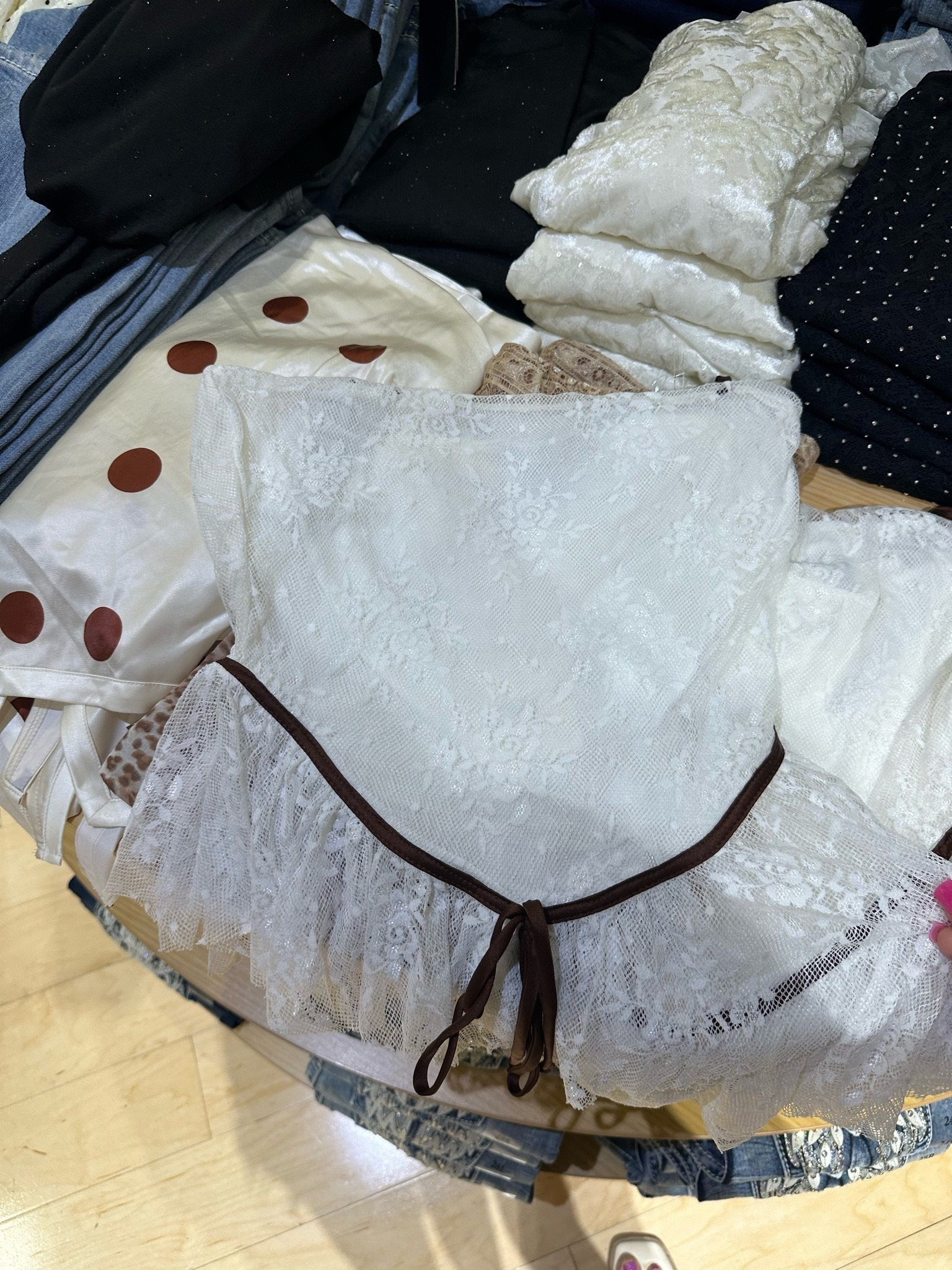 This white lace tank with brown ribbon from buckle is so cute! It would be adorable for a country concert with some brown boots! Ranges from sizes XS-XL & it’s priced at $32!

#LTKMidsize #LTKPetite