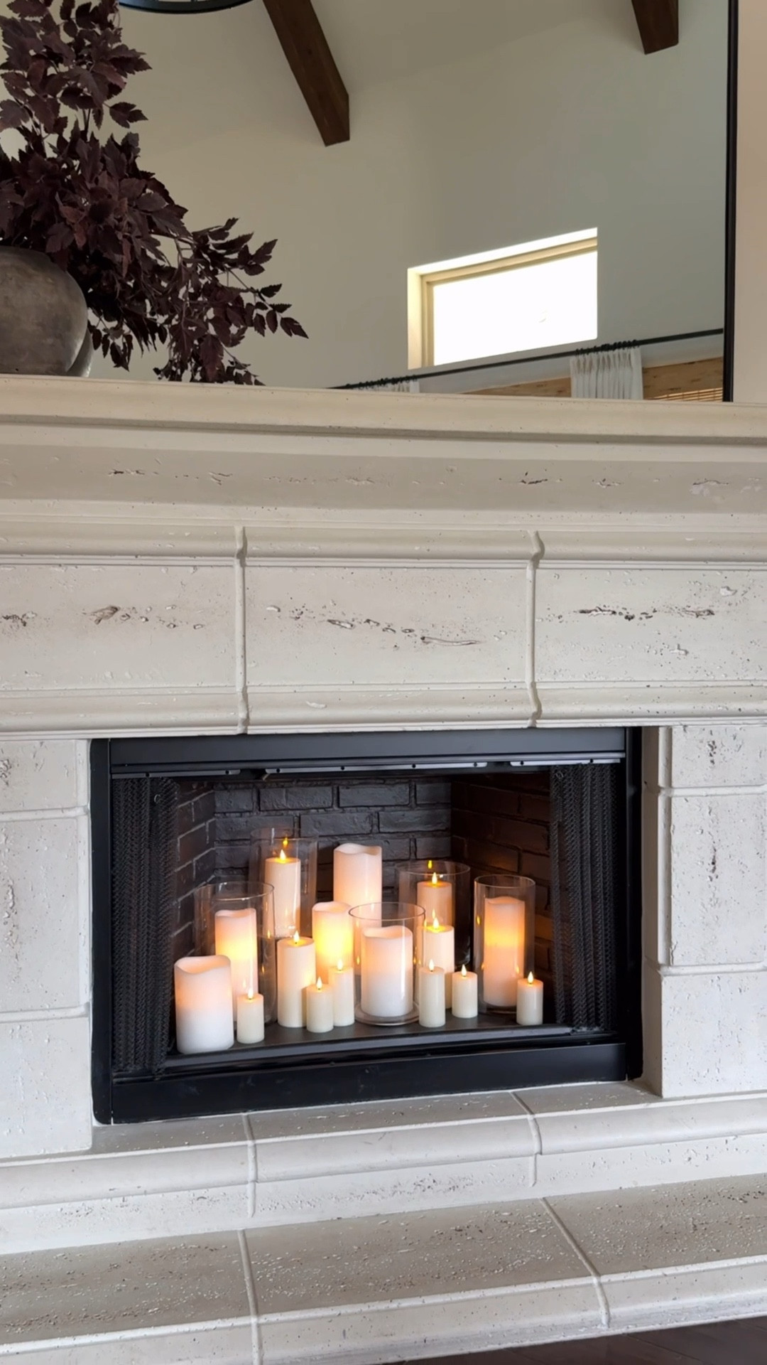 Add battery operated candles on timers to your fireplace for a cozy glow all year long 🕯️ 



#LTKHome