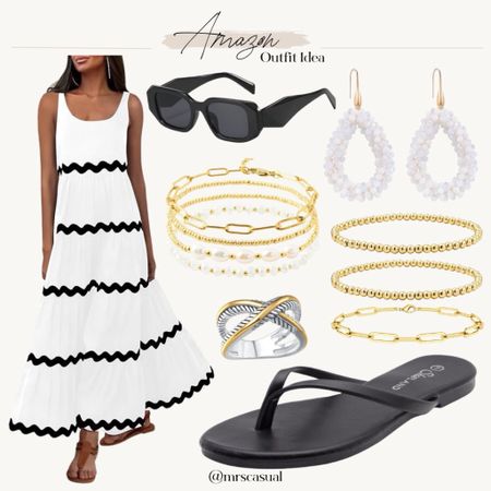 Cutest black and white scallop dress from Amazon for summer vacation 👏🏻

#LTKfindsunder50 #LTKstyletip 

#LTKSeasonal
