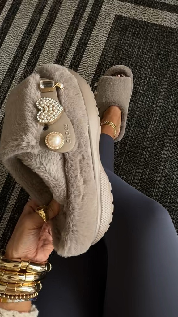 Even the wide feet girl can wear these crocs slippers! These are crocs new unfurgettable slides. They have the soft unfurgettable fur lining inside and out. And can be blinked out with your favorite charms. The top strap is adjustable to your foot.

#crocs #crocsunfurgettable #slippers #crocsslippers

#LTKHoliday #LTKGiftGuide #LTKShoeCrush