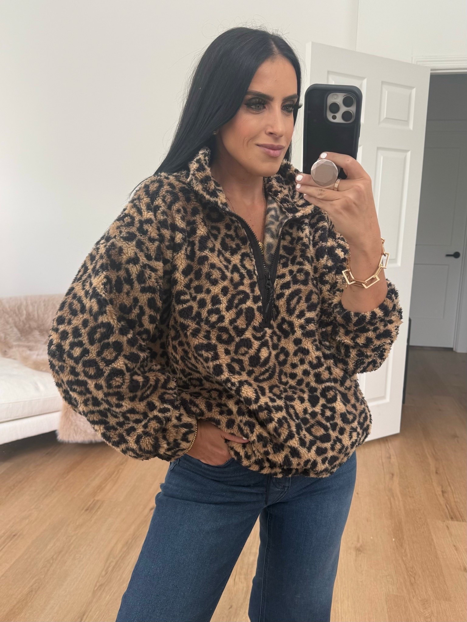 Walmart leopard Sherpa fleece no boundries plush half zip pullover wearing size large. Comes in ten colors 
