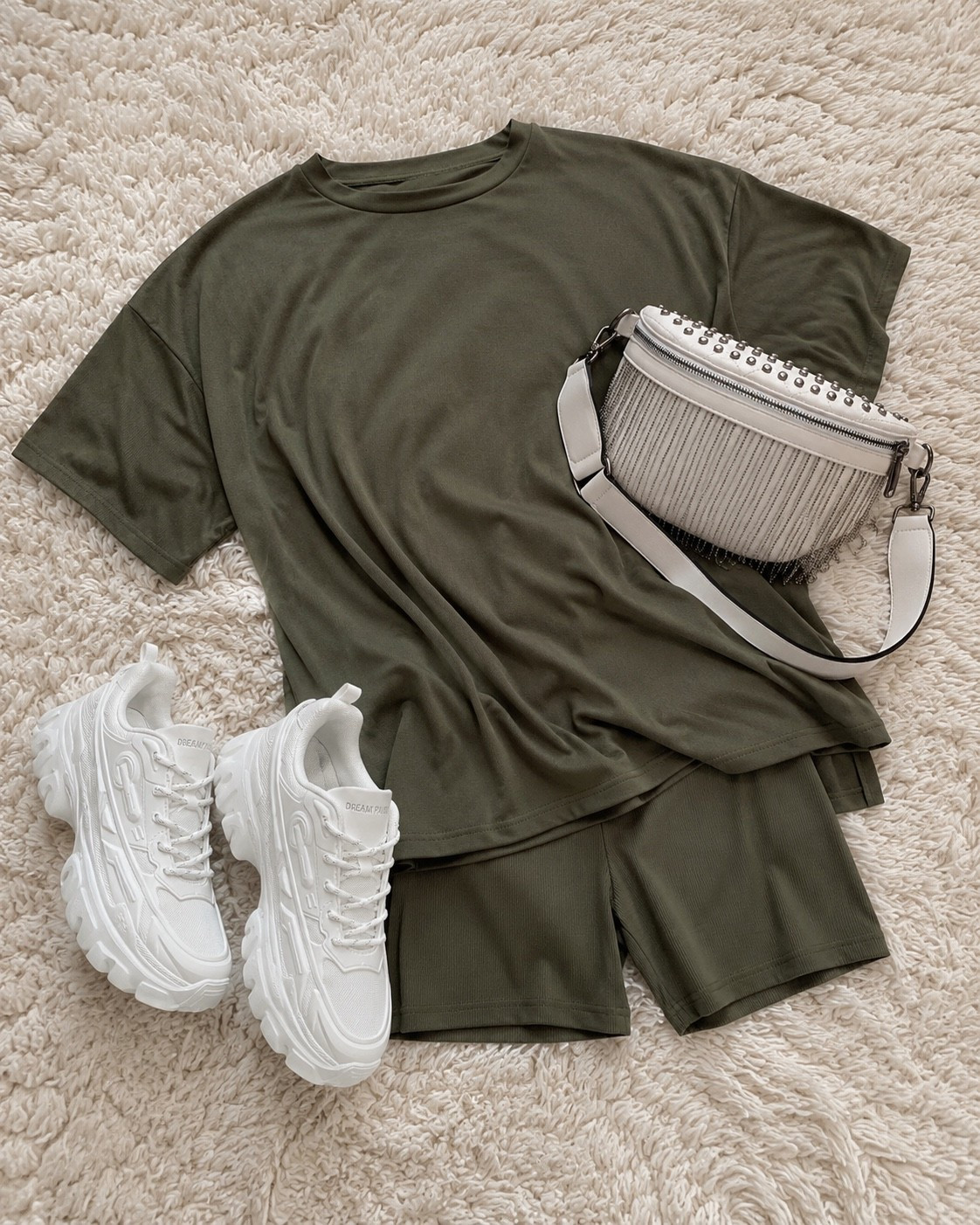 Olive green + crisp white will always be one of my favorite combos 🤍 This easy matching set is comfy enough for everyday but still looks pulled together with chunky sneakers and a statement bag. Perfect for errands, travel days, coffee runs… basically all the things.

Everything is linked here ✨

#LTKootd #LTKmomlife #LTKOver40