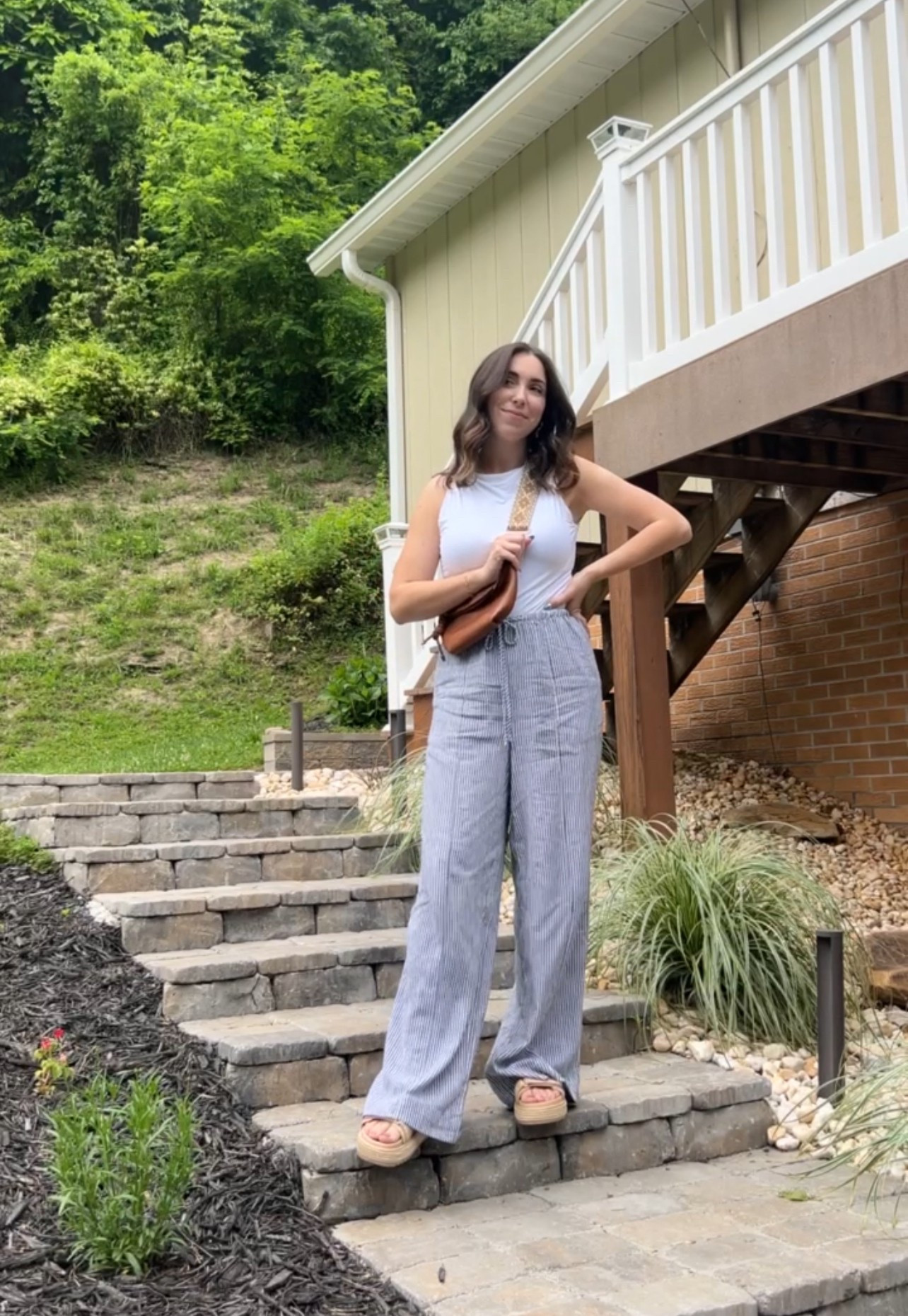 Spring outfit 🌸
Linen pants + white high neck bodysuit + leather crossbody + Steve Madden rattan raffia sandals 

#LTKWatchNow #LTKFindsUnder50 #LTKSpringSale
