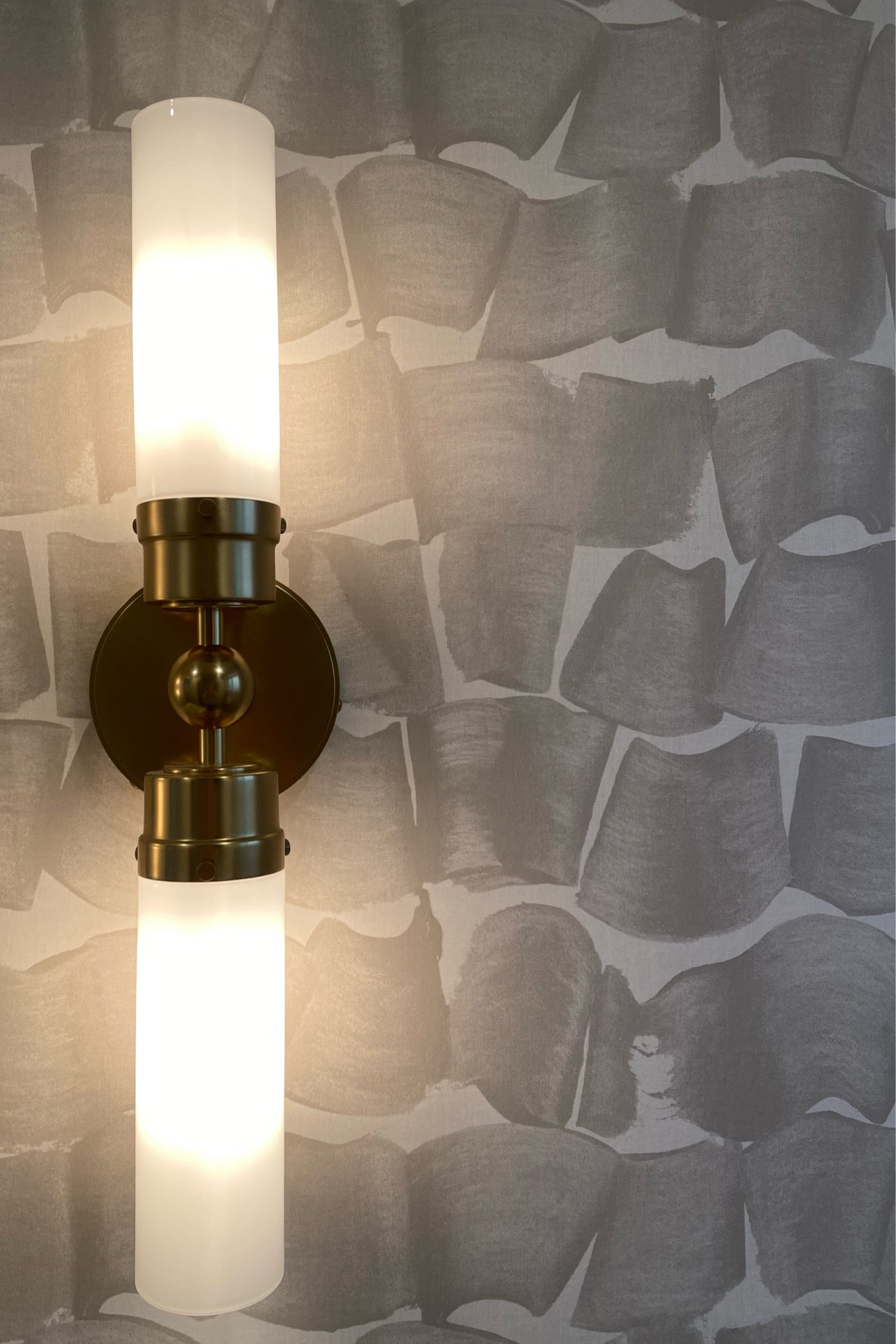 Fun, contemporary wall covering with a versatile sconce that can be used with almost any styled space! 

#LTKStyleTip #LTKHome