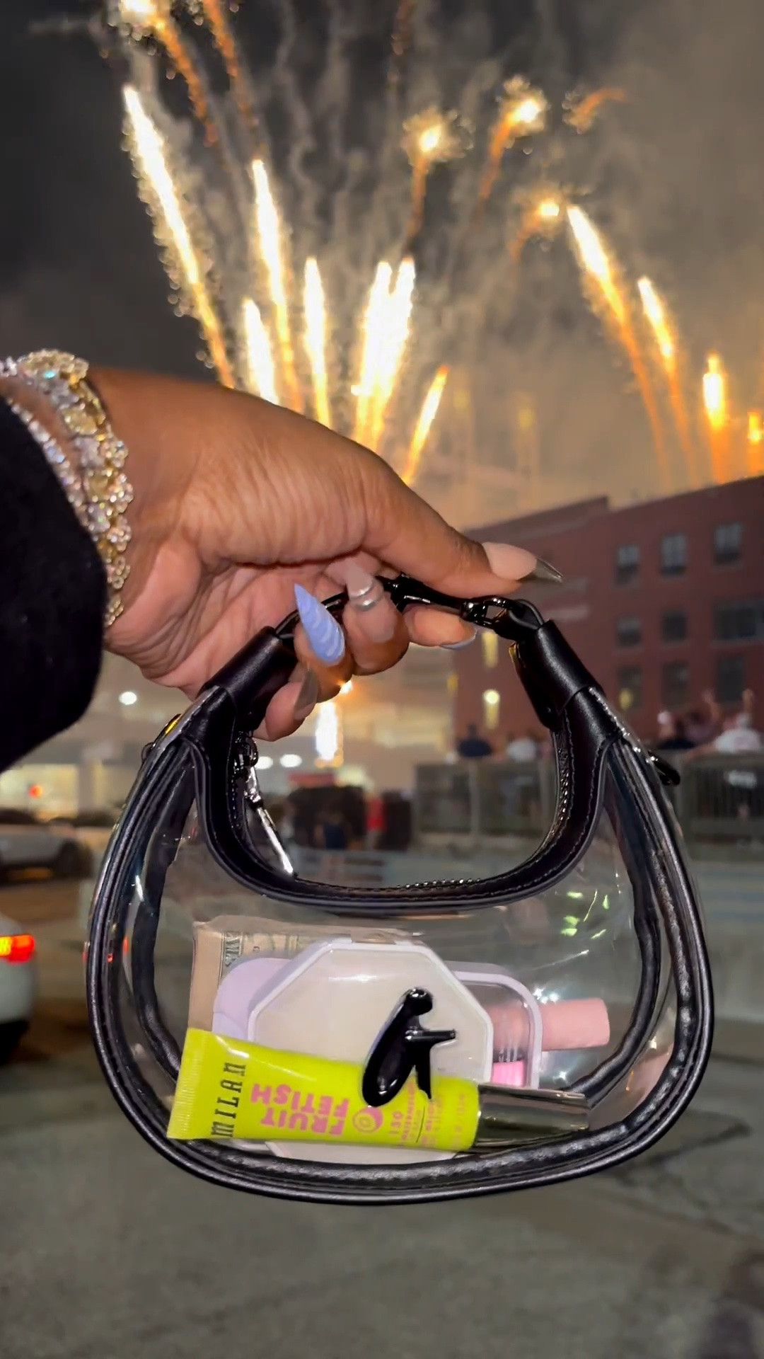 Summer nights, fireworks, concerts, girls’ trips, festivals, baseball games… this bag was MADE for moments like this! 

One thing about me? I love accessories that are both cute and functional, and this clear nano bag really does both.

The perfect size for your essentials without weighing you down, plus it can be styled as:
• a crossbody
• a wristlet
• or even a bag charm

Which honestly makes it one of the most versatile summer bags I own.

And because it’s stadium approved, it’s perfect for concerts, sporting events, and all the fun summer plans coming up.

Under $100 and one of those bags people always stop and ask me about.

Restocking May 29th at 3 PM EST, so if you missed it the first time, this is your reminder.