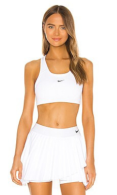 Nike Medium Pad Sports Bra in White & Black from Revolve.com | Revolve Clothing (Global)