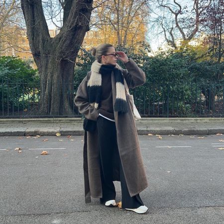 This weekday brown long coat makes the perfect coat for winter! Teamed here over a brown arket jumper, stripe arket scarf, wide left trousers and new balance sneakers 

Coat - size small
Jumper - size small 



#LTKstyletip #LTKeurope