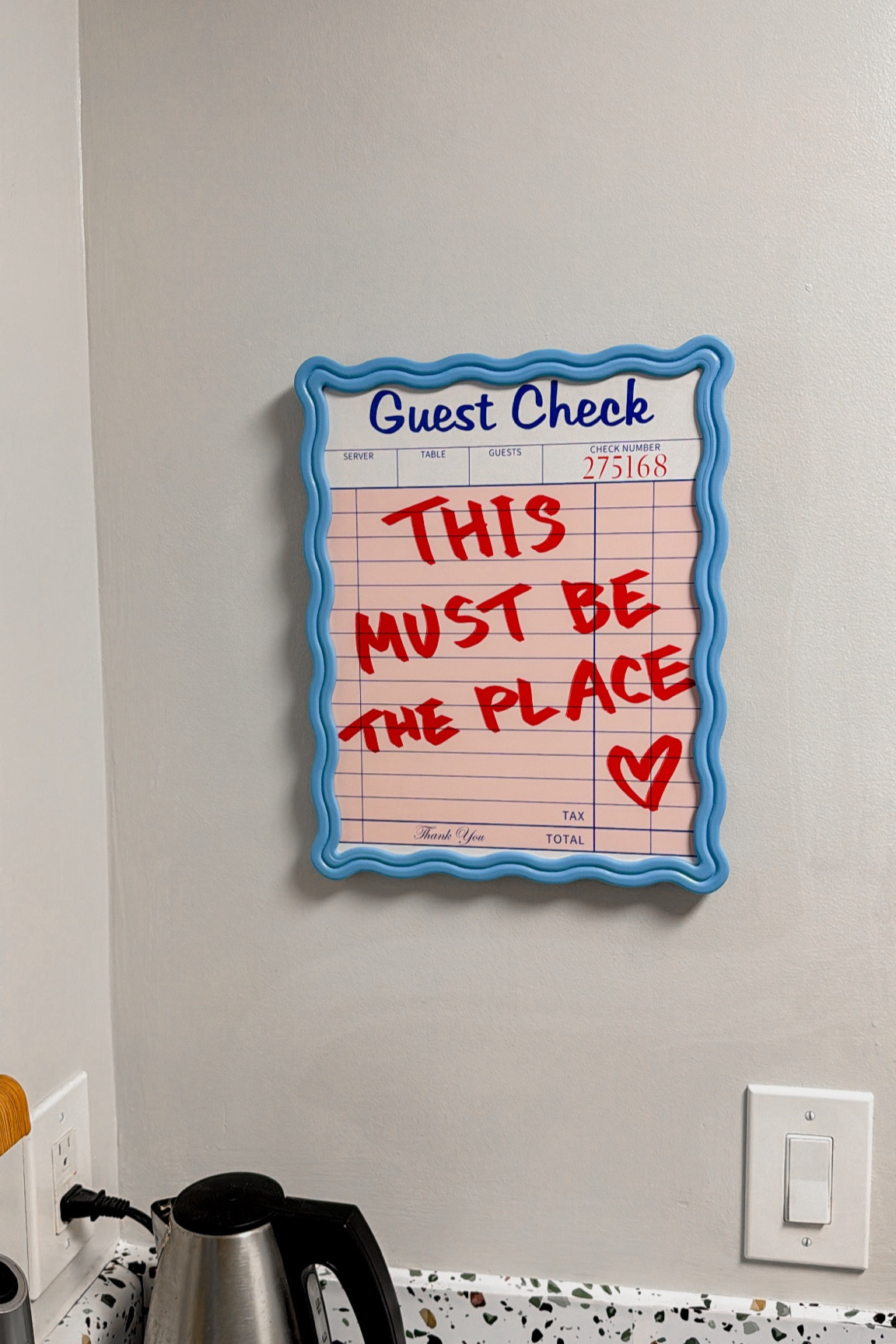 Modern guest book idea: get a guest check poster or digital printable and frame it with the print outside of the glass so that guests can “sign in” as they visit your home! I’ve linked to this set of wavy frames plus a couple of physical and printable guest check options. // diy guest book, housewarming ideas, housewarming gift idea, dorm move in idea, light blue frame, modern decor

#LTKHome