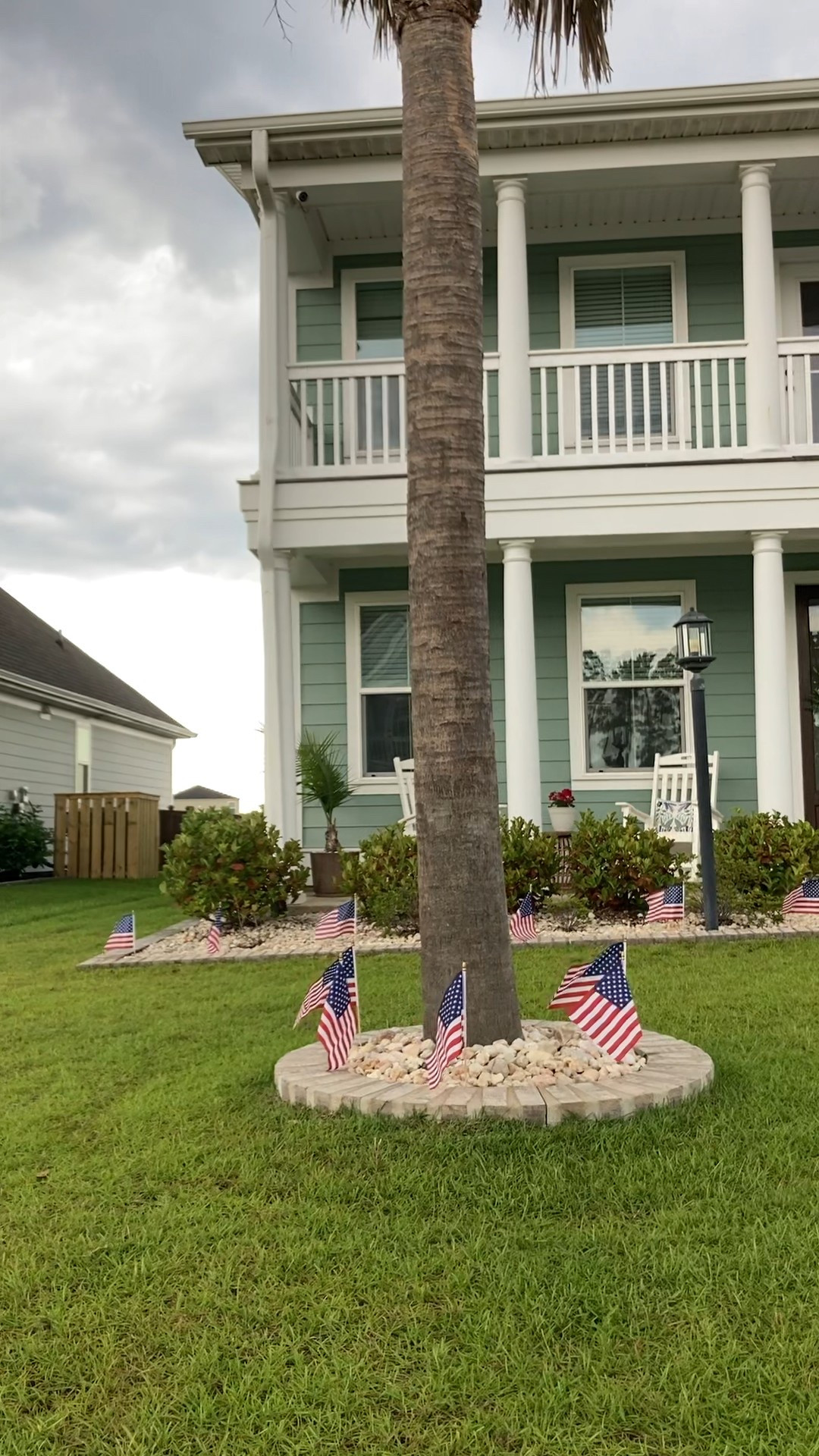 The perfect combination of small flags along the garden bed and a large flag mounted on the house to show our patriotism!

#LTKHome #LTKSeasonal #LTKOver40