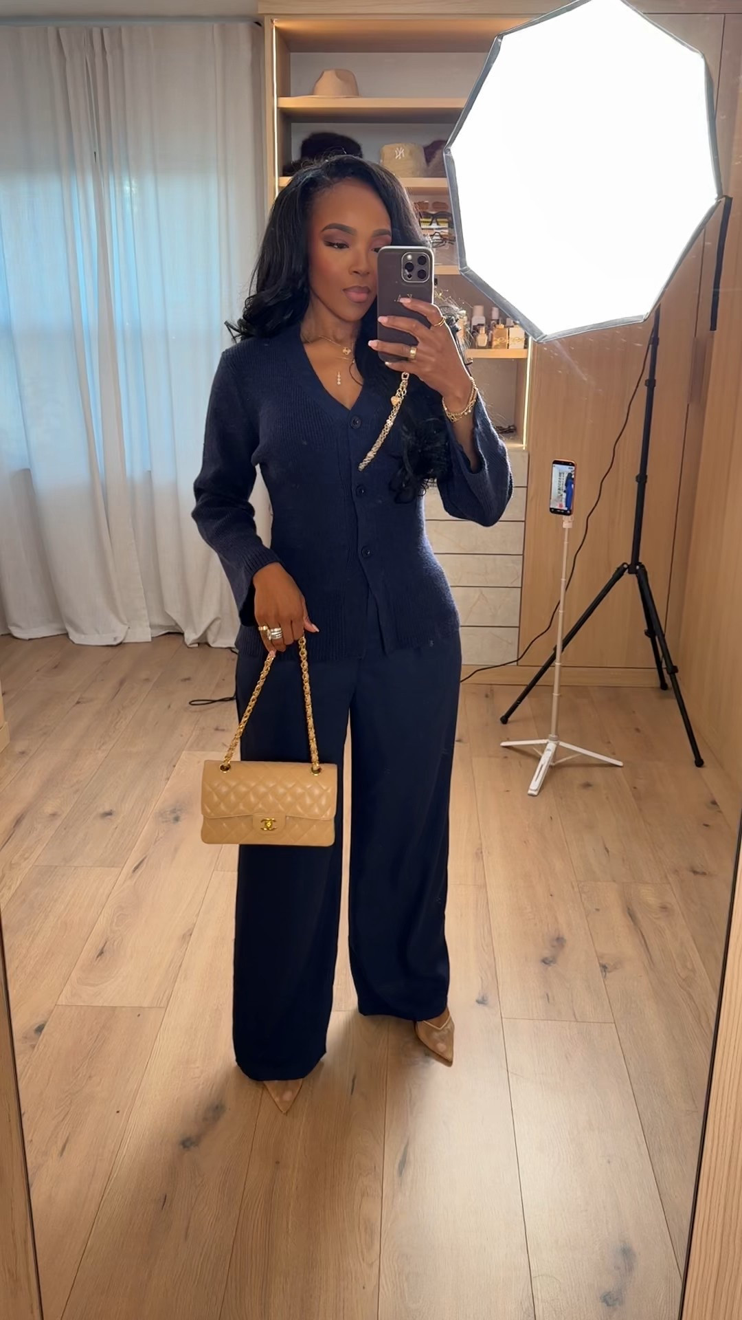 This navy set is one of those quiet luxury looks that works for so many moments. The button-front top paired with matching wide-leg pants creates a long, streamlined silhouette that feels polished but still effortless. It’s a perfect example of a long-term shopping piece — timeless, versatile, and easy to restyle, so the cost per wear keeps going down.

Style it with heels and a structured bag for dinner or meetings, or swap in flats for an elevated everyday look.

Tap to get details and shop this full look instantly on the app.

📏 Sizing:
Wearing size Small  
Height: 5’4”  
Weight: 138 lbs  
Bust: 34D  
Waist: 27”  
Hips: 40”

This outfit is ideal if you’re searching for navy outfit ideas, monochrome sets for women, elevated basics, capsule wardrobe staples, and polished everyday looks.

Follow me on Instagram and YouTube @kirasfashionfinds

#LTKWorkwear #LTKgrwm