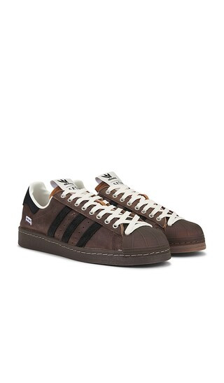 Superstar 82 Sftm Sneakers in Tan, Core Black, & Cream White | Revolve Clothing (Global)