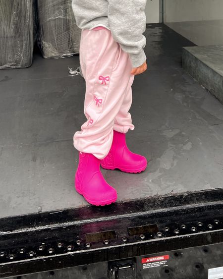 Taya fave rain boots on sale! They’re super thick soles and water repellent, I love that they slide on and go up high enough to keep her dry. This pink is adorable!!! TTS w a roomy wider fit perfect with socks! Shes in an 8💖