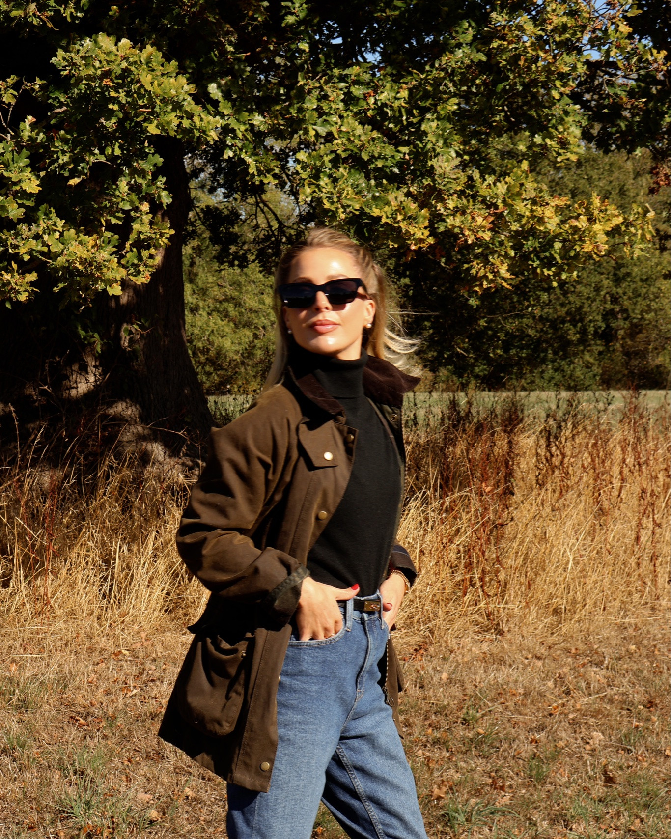 An everyday country outfit, jeans, roll neck jumper, Barbour and knee high boots